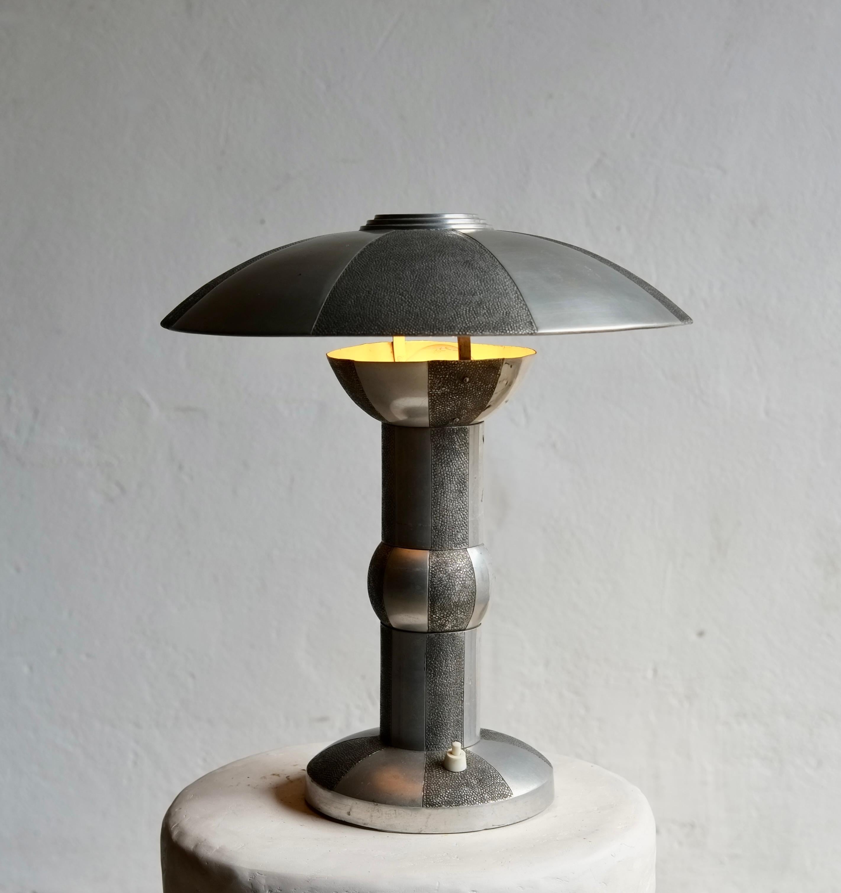 An original  1930's Art Deco aluminium metal lamp with a shagreen effect. 

Some scratching to the metal. 