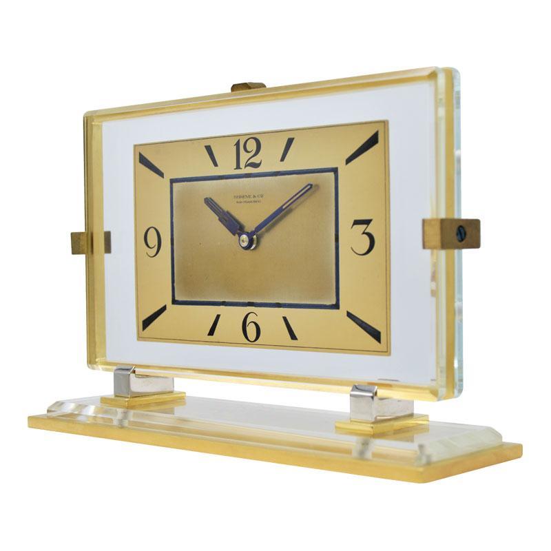 FACTORY / HOUSE: Shreve and Company San Francisco
STYLE / REFERENCE: Art Deco Glass, Gilt and Nickel
MOVEMENT / CALIBER: 15 Jewels
DIAL / HANDS: Gilt Dial, Blued Steel Hands
DIMENSIONS: 7 3/8