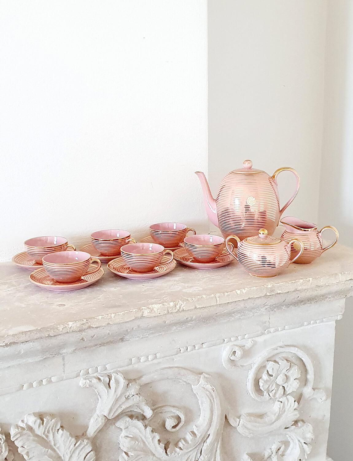Extraordinary 1930s Richard Ginori Italian Coffee Service in baby pink with gold stripes. This fifteen piece set was found in Tuscany and was a wedding present which had never been opened and used by a couple in the 1940s. The wedding stickers are