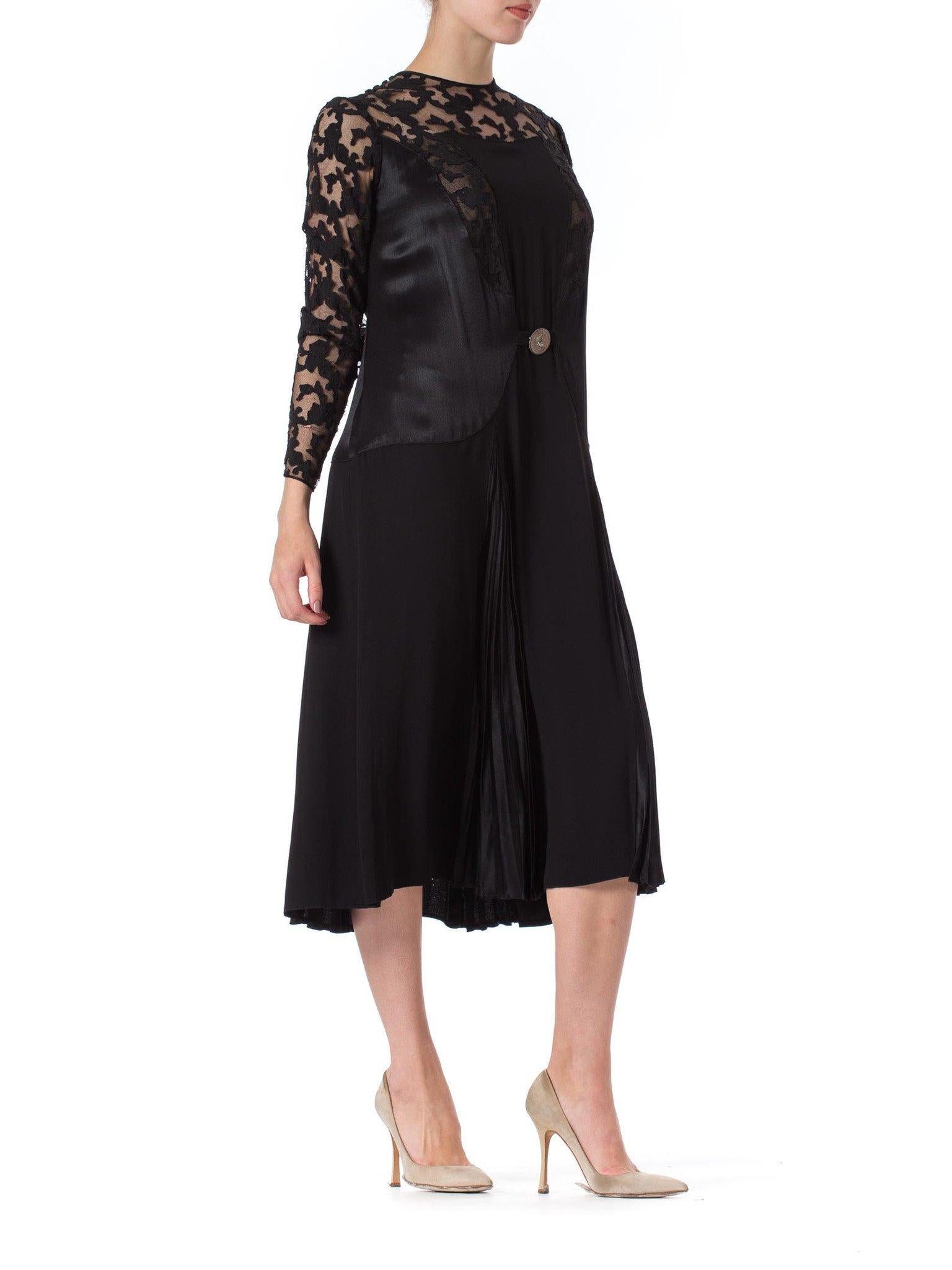 Women's 1920S Black Silk Crepe & Appliquéd Net Dress With Gorgeous Buckle Sleeves For Sale