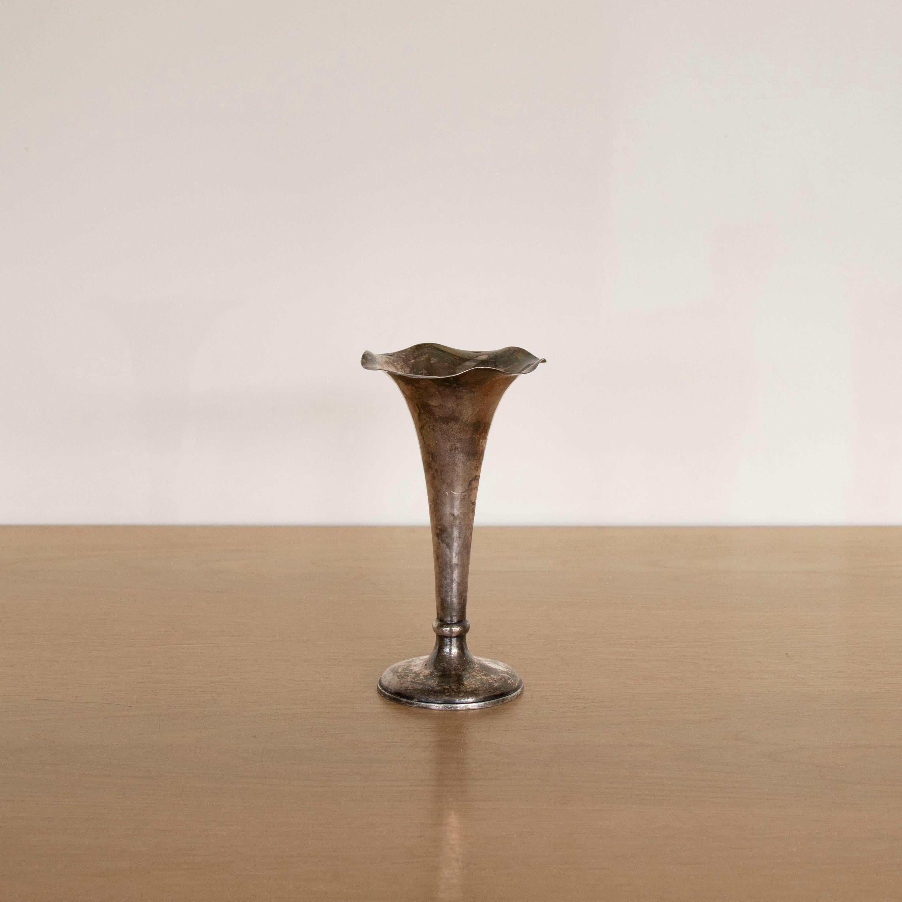 Lovely decorative silver plated vase from Switzerland, 1930's. Fluted stem with wavy detail. Inscribed with Swiss restaurant on base. Original finish shows great age and patina. 