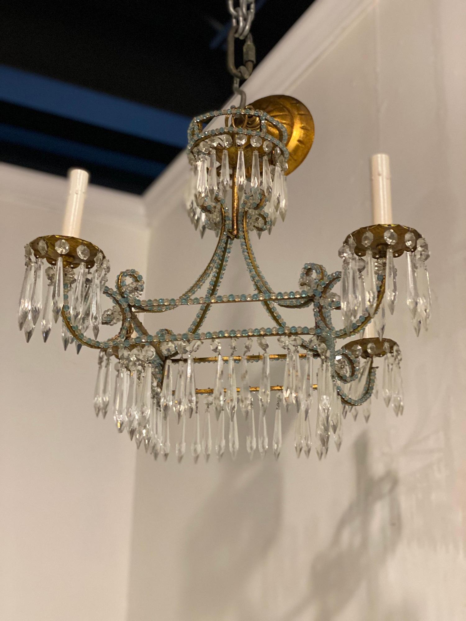 Gilt 1930s Small Italian Four Lights Chandelier with Blue Crystals For Sale