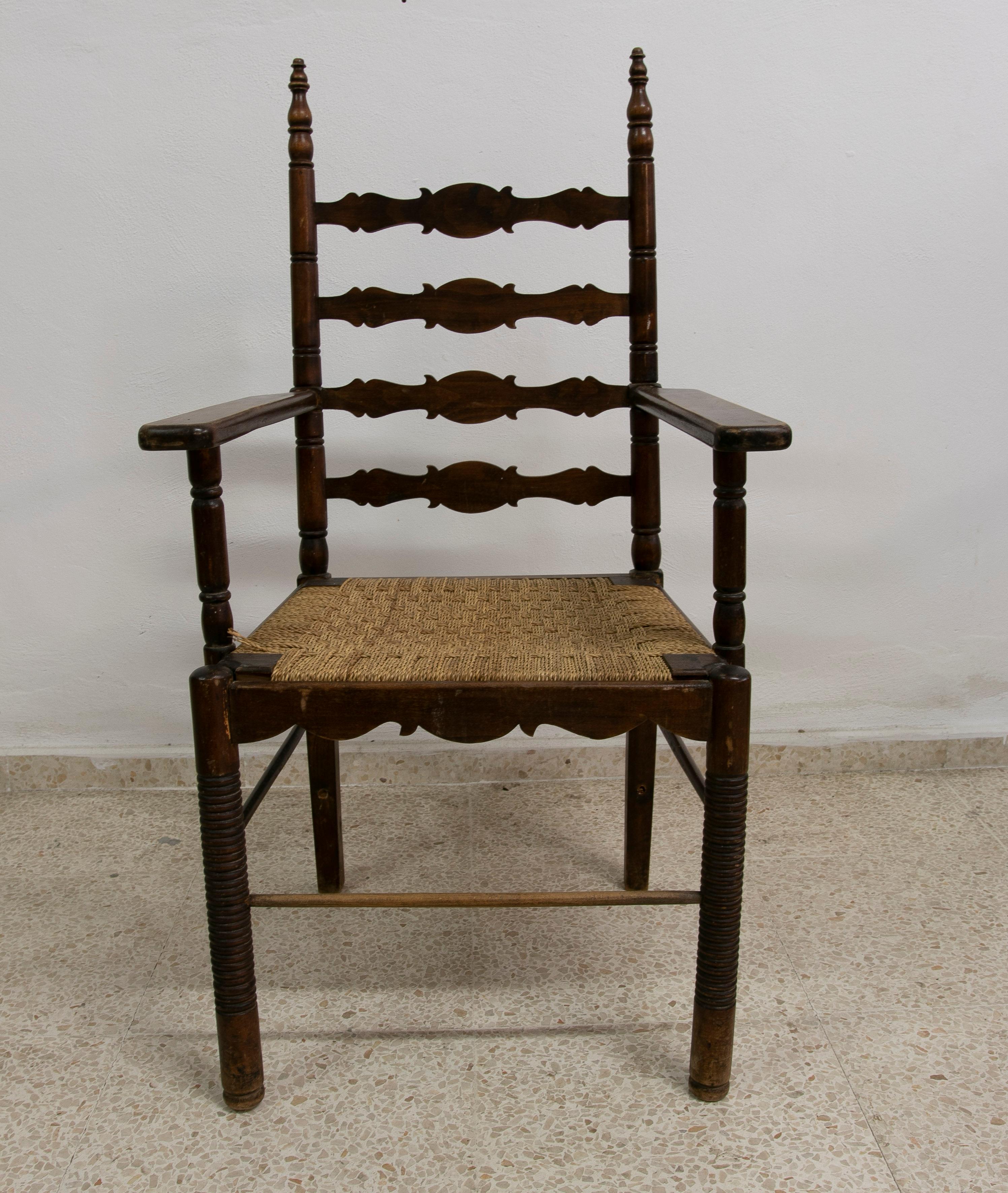 Original 1930s Spanish Andalusian flamenco set of 8-chairs and 2 armchairs with woven bulrush seats.

Chairs measurements: 111x46x40cm
Armchairs measurements: 100x61x49cm.