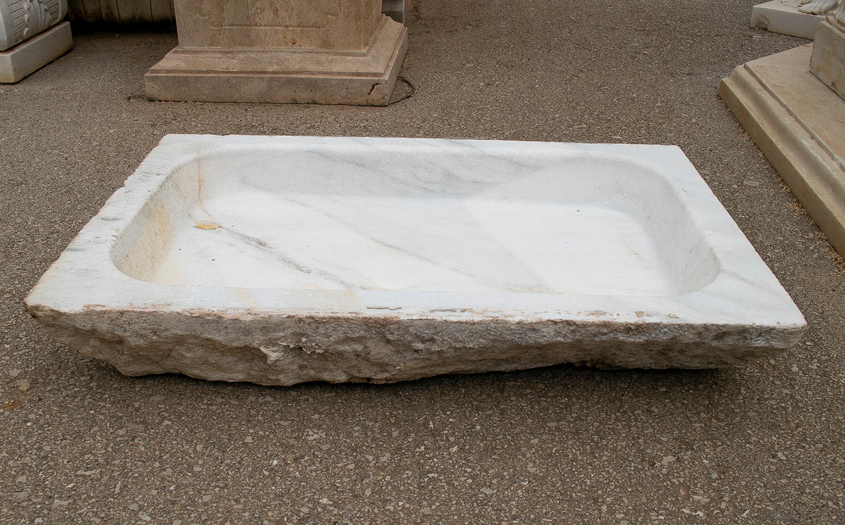 1930s Spanish hand carved white Macael marble wash basin.