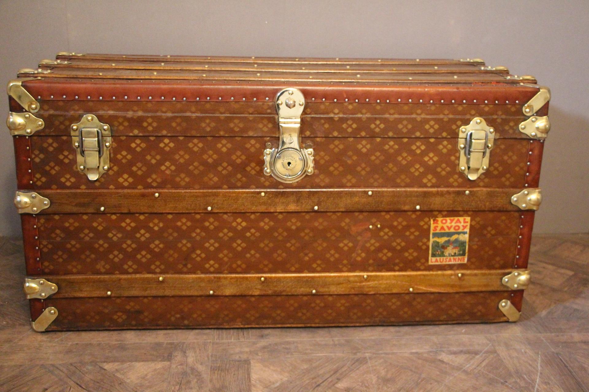 This beautiful French steamer trunk features canvas, solid brass locks, clasps and corners as well as leather side handles.
Its lock has been replaced a long time ago.
Its interior is in perfect condition, completely relined by a professional. It