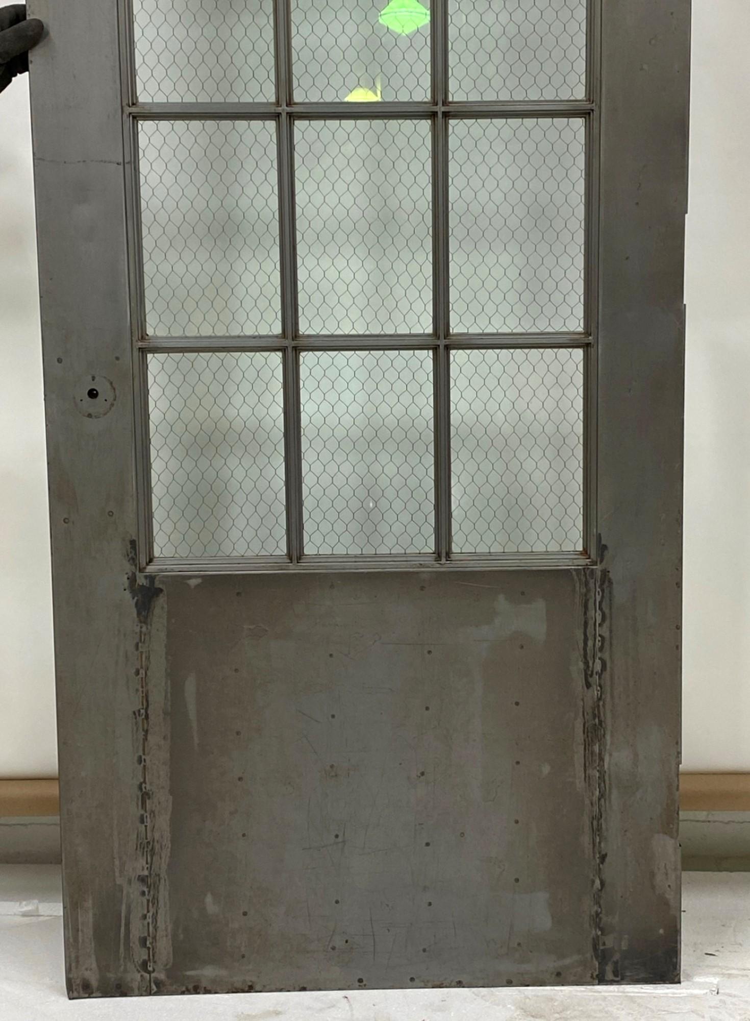 1930s Steel Fire Door with Chicken Wire Glass 12 Lites by Art Metal Co. 1