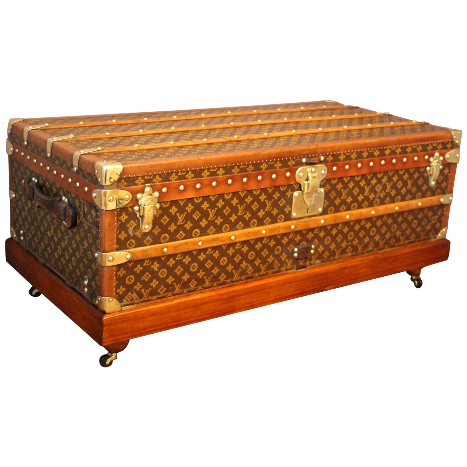 This beautiful Louis Vuitton trunk features stenciled hand painted monogram canvas and honey color lozine trim.
All solid brass LV stamped studs and locks as well as solid brass corners.
Leather handles on each side.
Its interior is all original