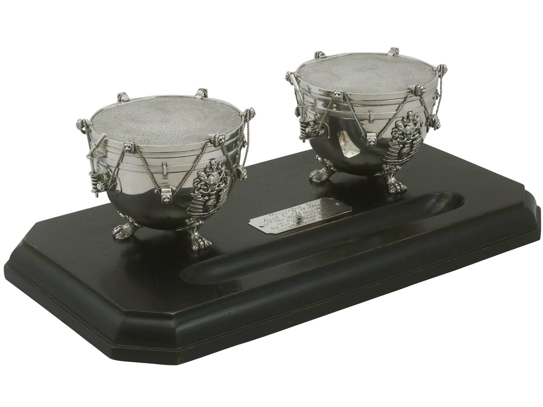 An exceptional, fine and impressive, and unusual antique George V sterling silver inkstand with plinth modelled in the form of kettle drums, with military interest; an addition to our inkwell collection

This exceptional and unusual, antique