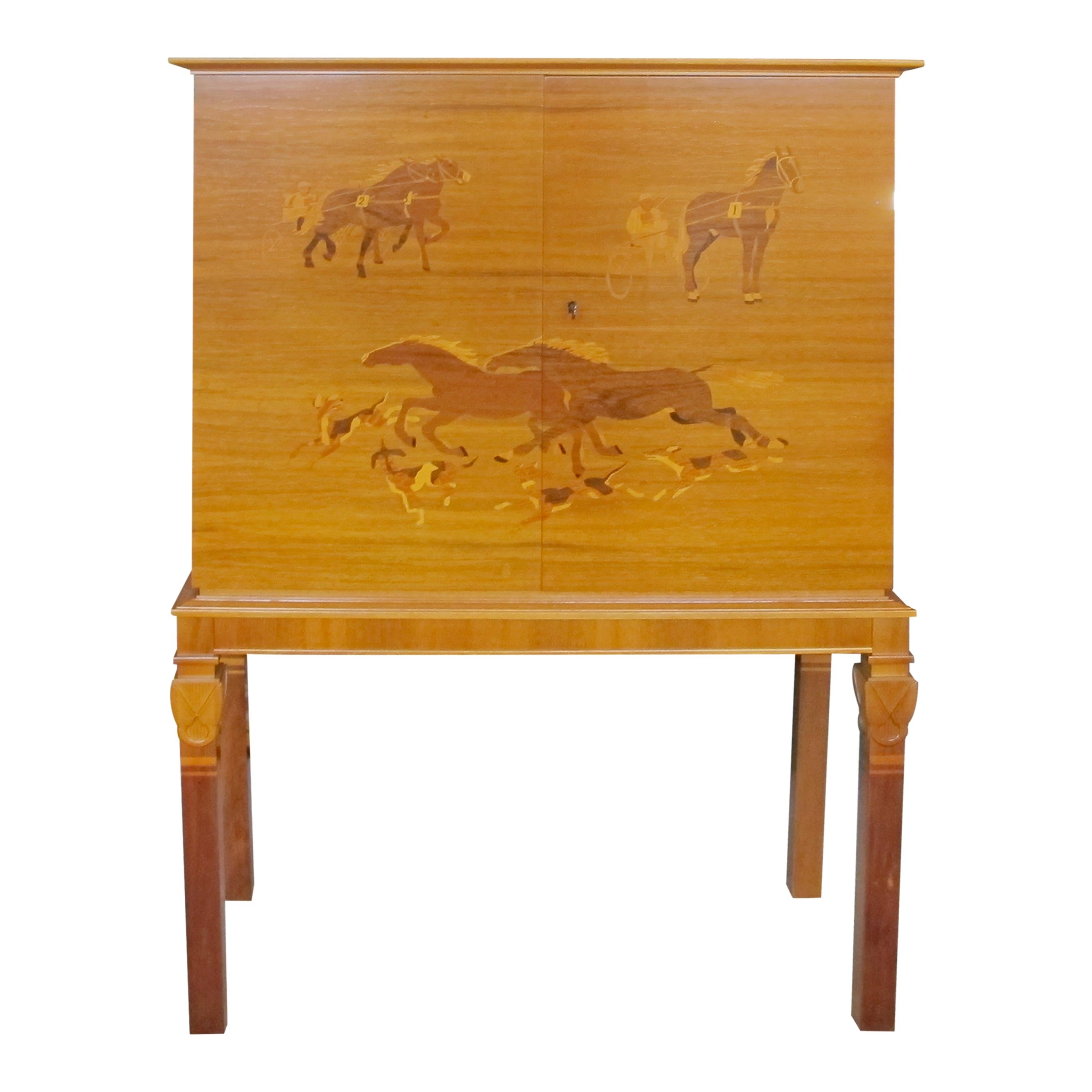 1930s Swedish cabinet attributed to Erik Mattsson, featuring elegant inlay marquetry that captures the dynamic essence of harness racing horses. The cabinet's front panels are adorned with detailed depictions of horses in motion, made from walnut,