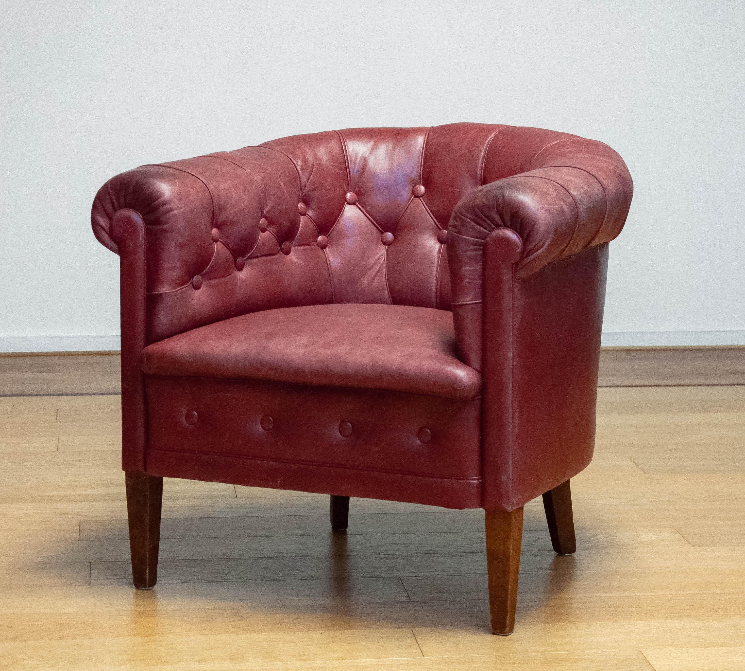 beautiful Chesterfield style leather club chair made in the 1930s in Sweden. The chair is stil in original condition and therefor the leather has become a great patina true the years. The condition of the leather is good and still very smooth. The
