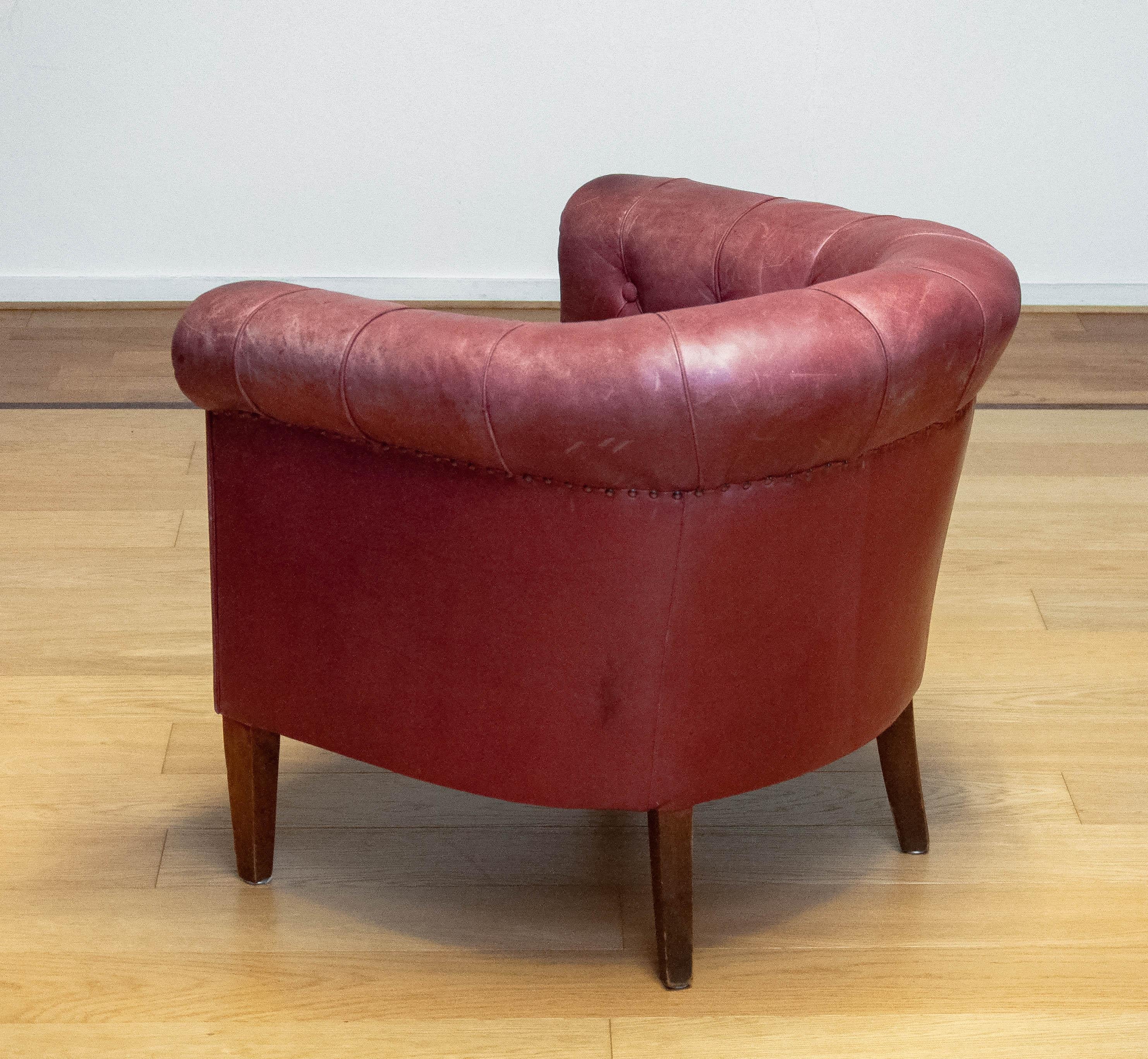 1930s Swedish Crimson Red Chesterfield Club / Lounge Chair in Patinated Leather In Good Condition For Sale In Silvolde, Gelderland