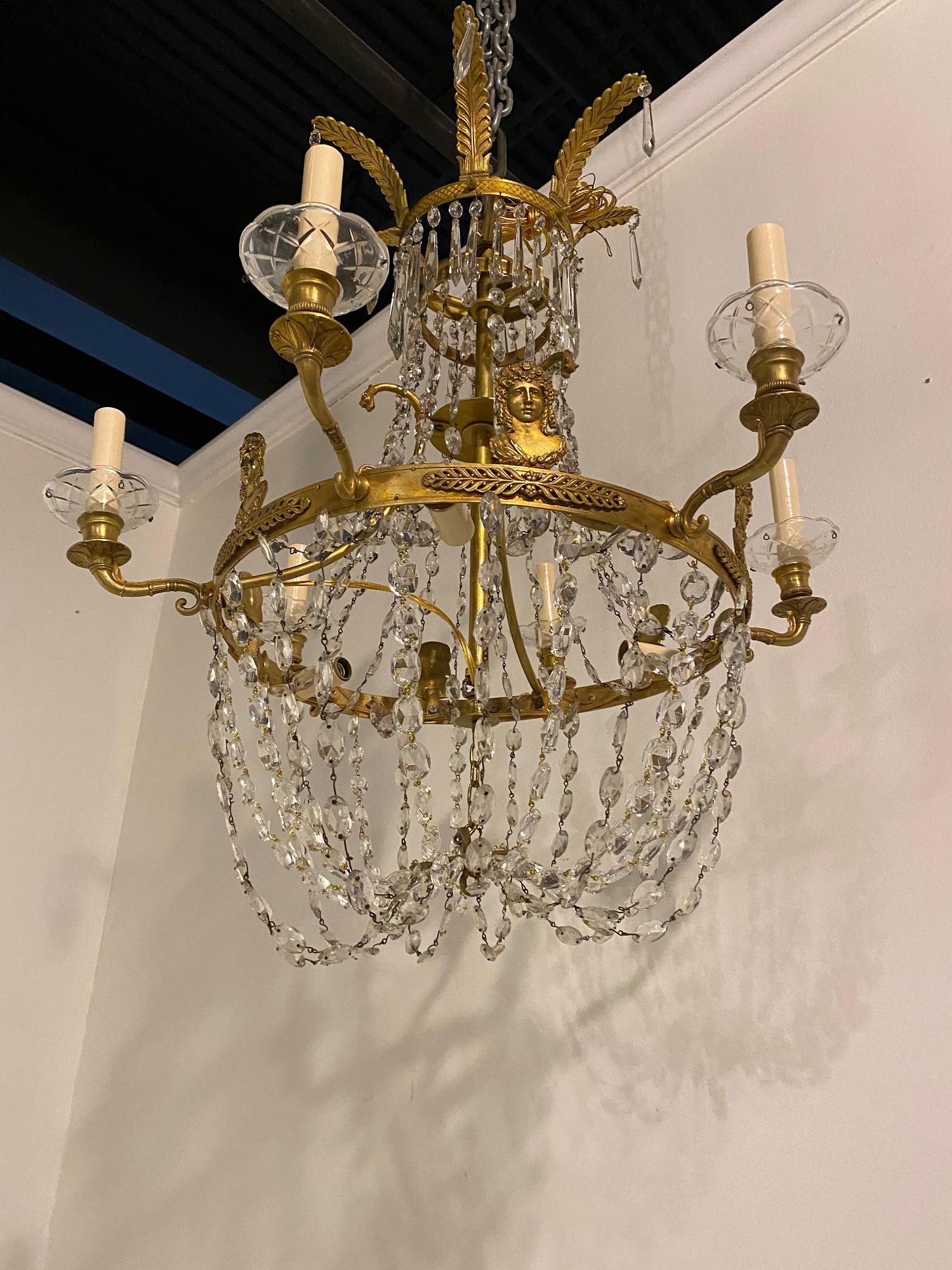 A circa 1920’s Swedish empire style crystal chandelier with 6 lights