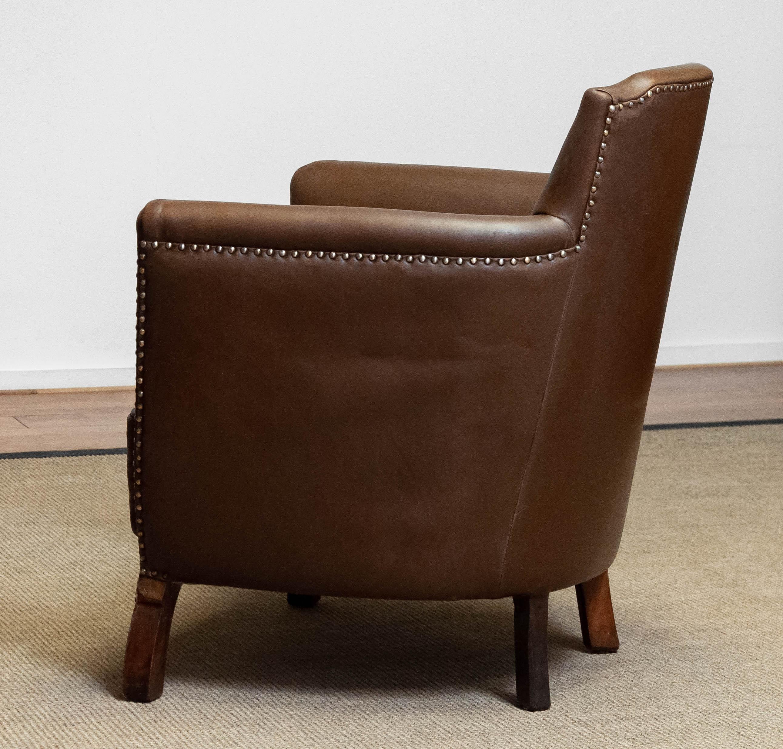 Mid-20th Century 1930s Swedish Tan / Brown Nailed Leather Lounge Chair By Otto Schultz For Boet For Sale