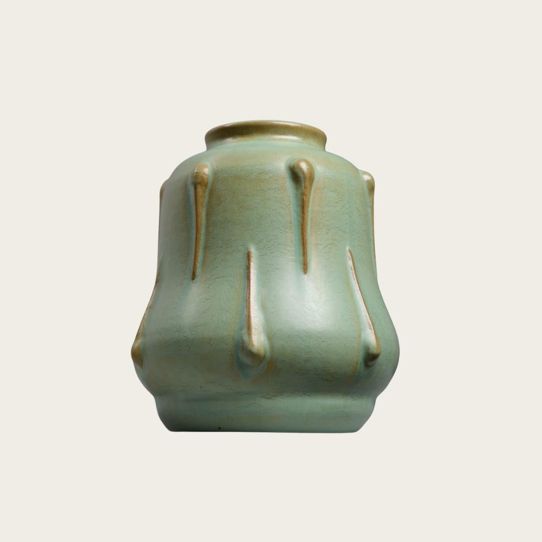 1930s, Sweden. A mint green and beige glazed earthenware vase designed by Ewald Dahlskog and produced by Bo Fajans, Sweden, c. 1930s in Scandinavian modern style. In excellent condition. Marked Made in Sweden Bo Fajans on underside.
