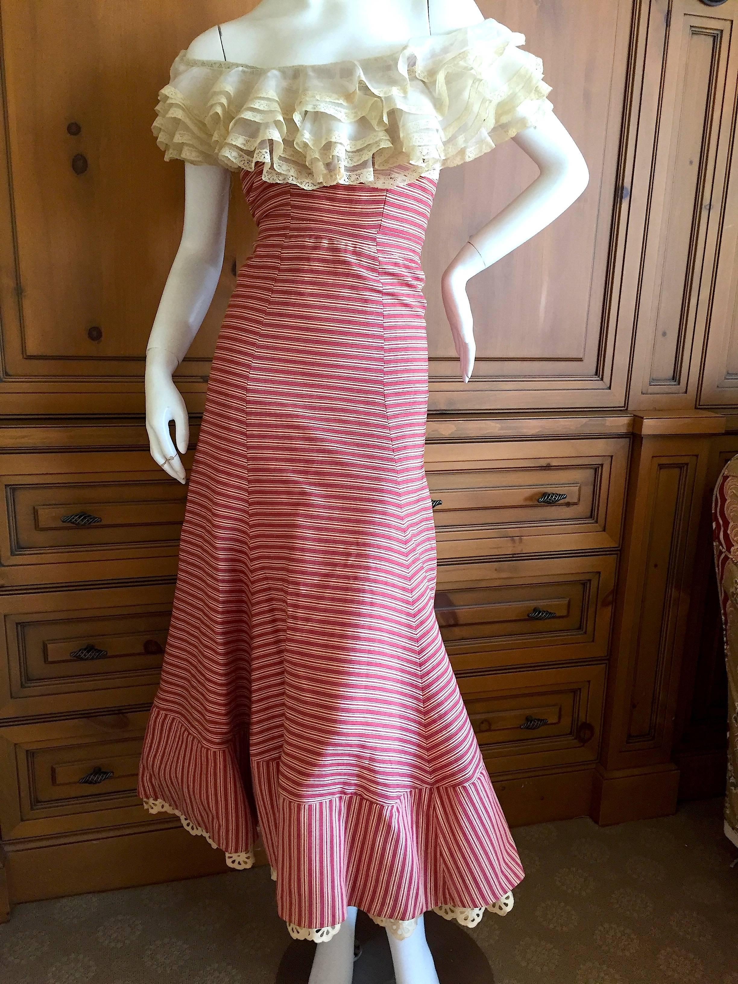 Elegant stripe day dress with lace at the bust and hem.
This beautiful dress belonged to Eleanor de Guine.
This has no label, but details are similar to another dress from this collection which is labeled Saks Fifth Avenue Original.
From the de