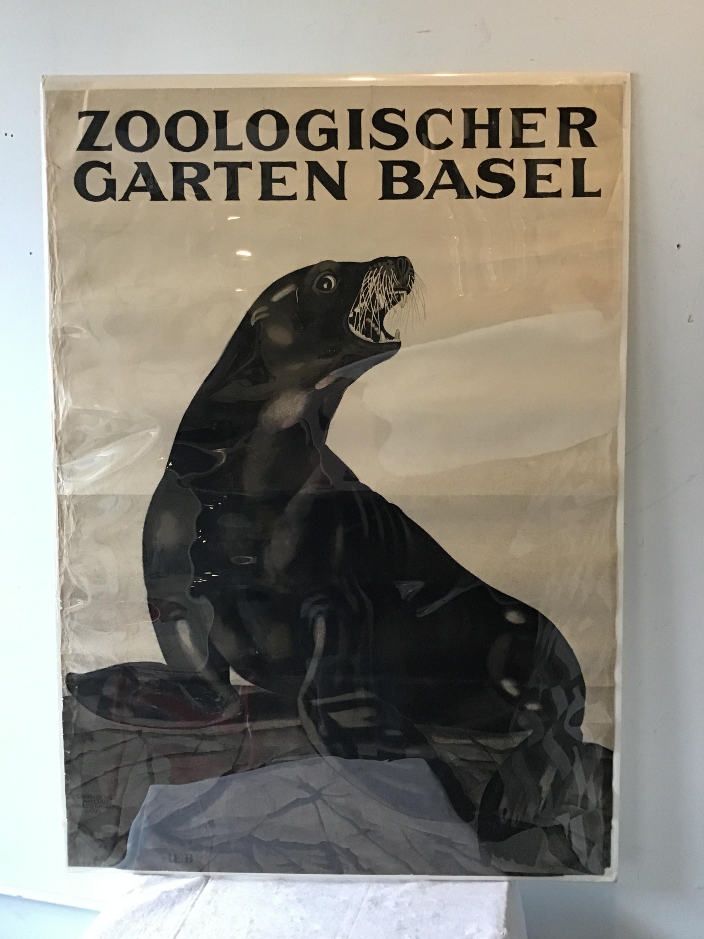 1930s Swiss Zoo Basel poster of a seal on a rock. Poster under cellophane.