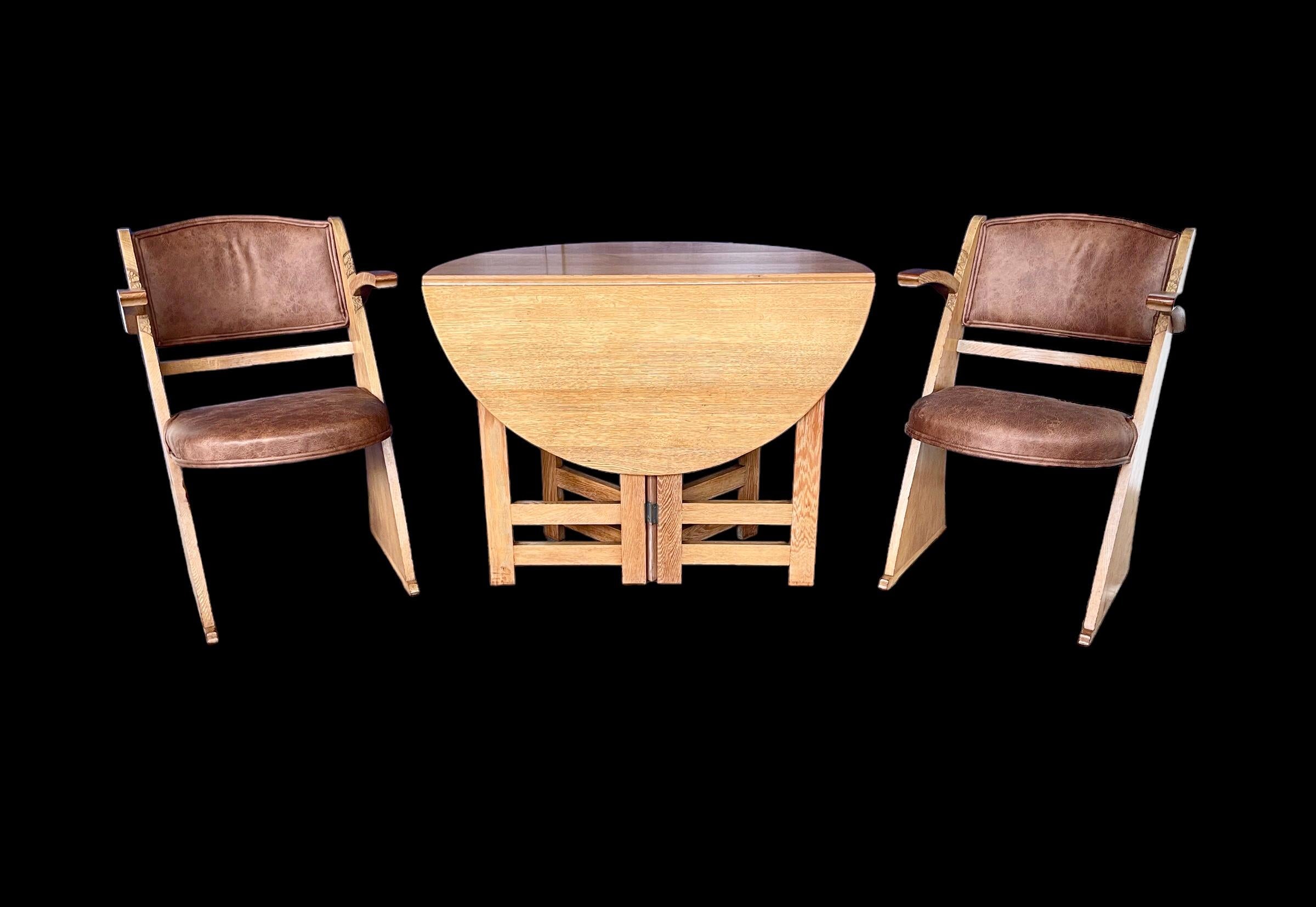 A ‘New Cromwell oak’ dining suite designed by E Gomme based in High Wycombe, each chair stamped with the registered number 778034. Comprising a drawer-leaf dining table, 2 dining chairs & 2 carvers, each with an arched authentic looking leather