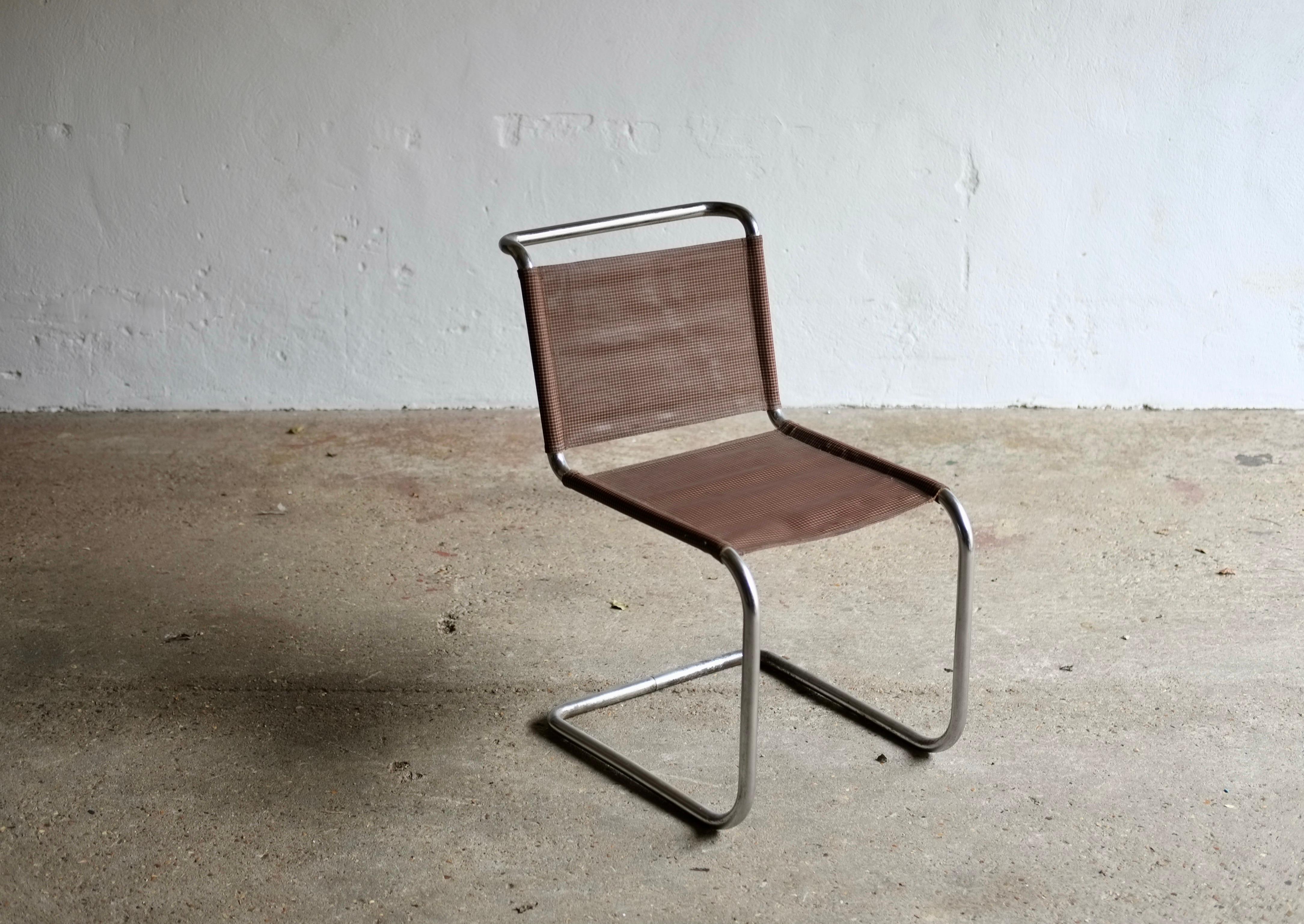 An original 1930's Thonet B33 side chair by Marcel Breuer (Hungarian 1902-1981) designed 1925-7 , slung with Tygan. 

This particular chair came from the collection of interior designer Zeev Aram, famous as the founder of the legendary London