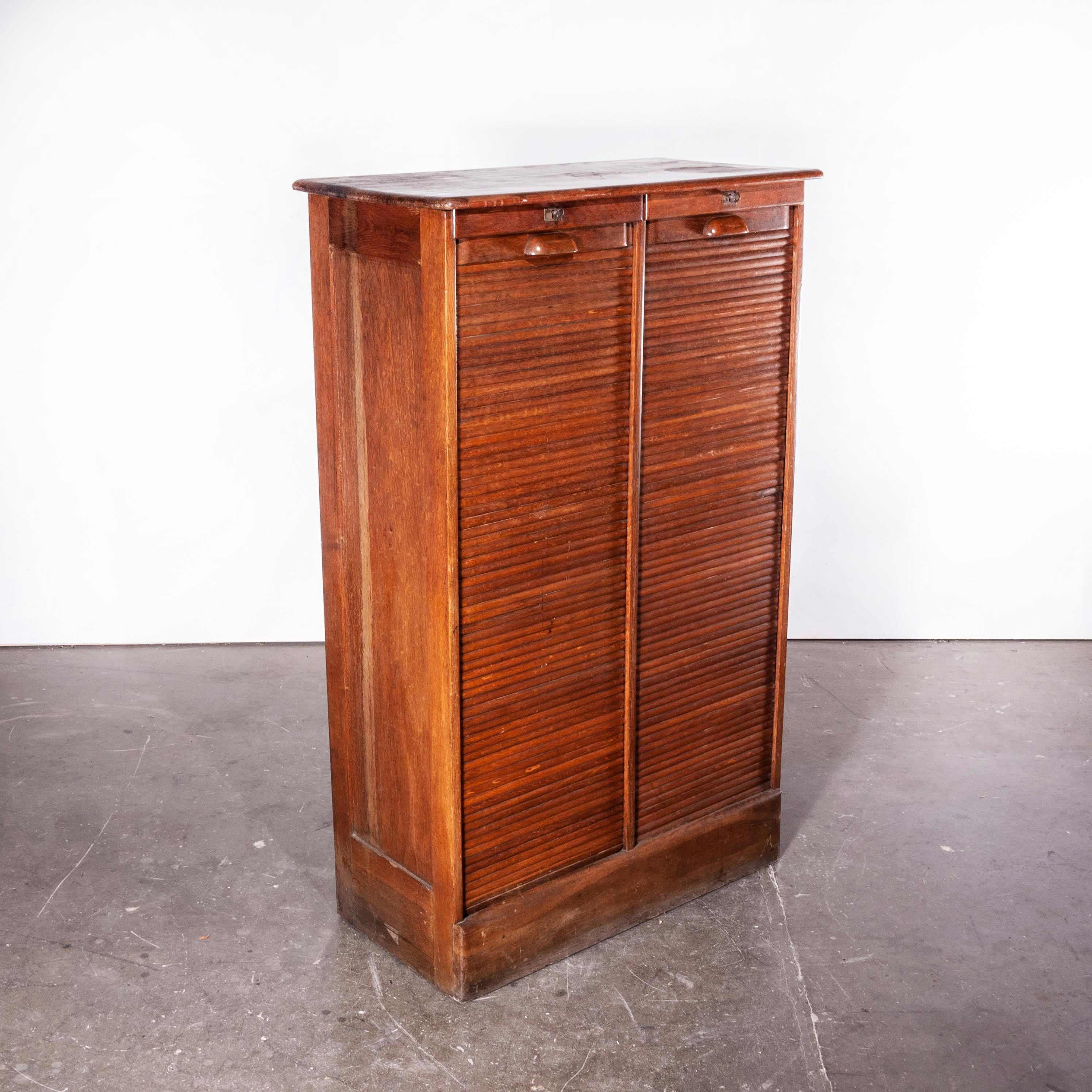 1930s Thonet tambour fronted oak cabinet
1930s Thonet tambour fronted oak cabinet. Founded in the early 19th century by Michael Thonet, Thonet invented the process of steam bending wood under pressure and used this to design the Classic bentwood
