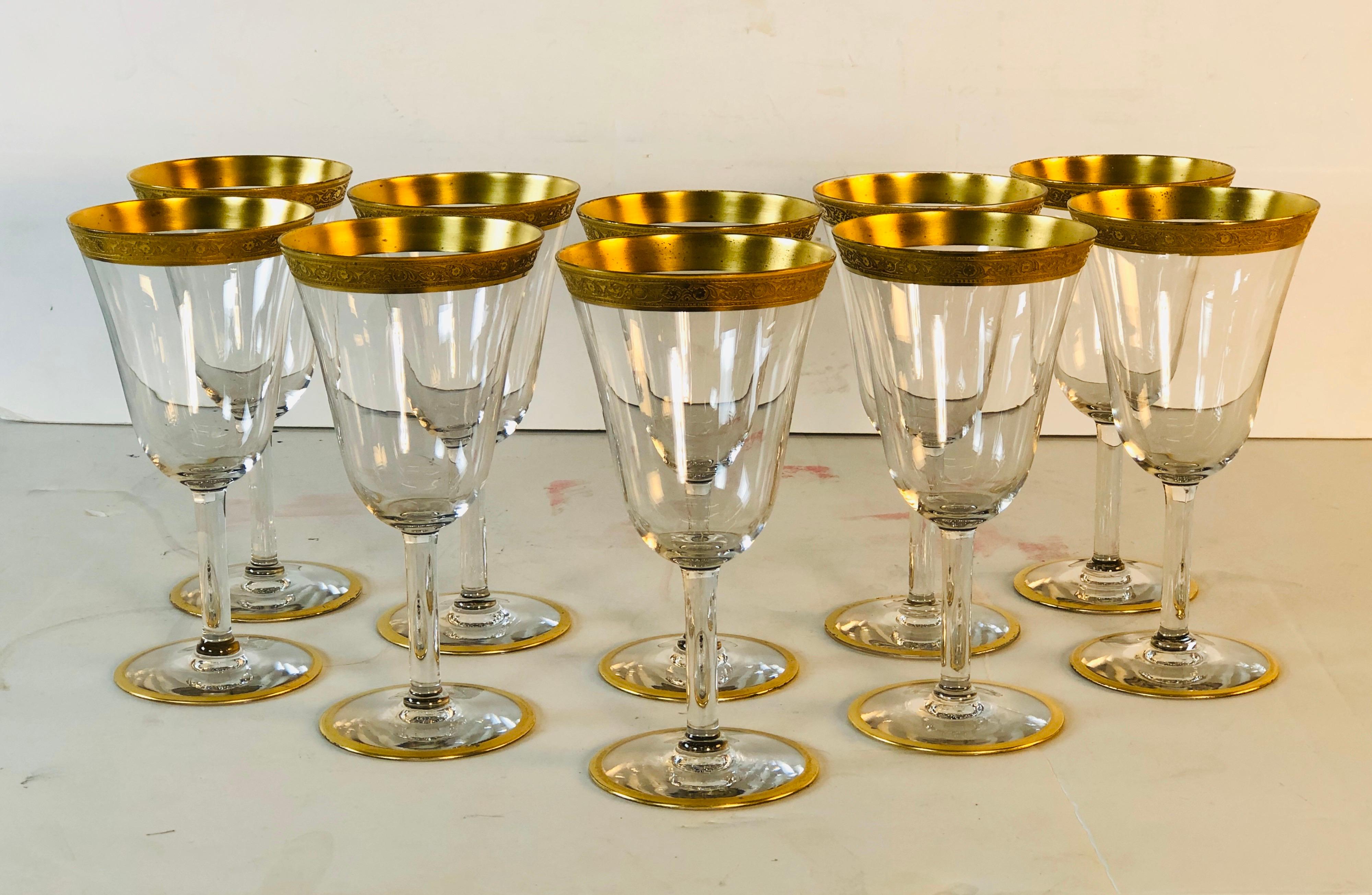 Vintage 1930s Tiffin Glass set of 10 Ramblin rose gold rim water/wine stems. The stems have a gold accent on the bases along with the rose design on the rims. Very good condition with some tarnish on the gold rims. No marks.