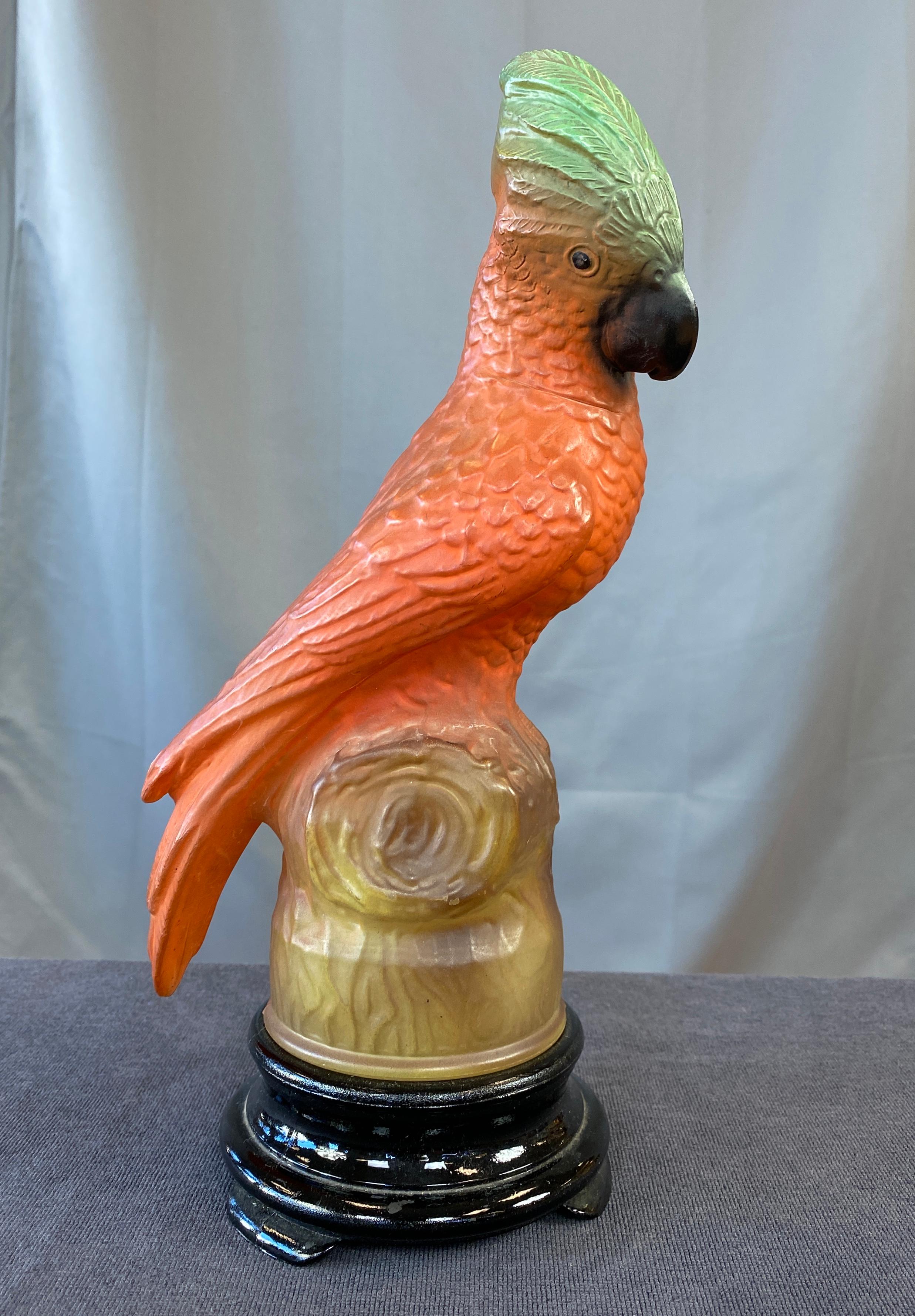 1930s Tiffin glass parrot lamp, The Tiffin Glass Company was based in Steubenville, Ohio
it stands on a black glass base, unscrew the two, to install thew bulb. Lamp has a new black cloth cord.
