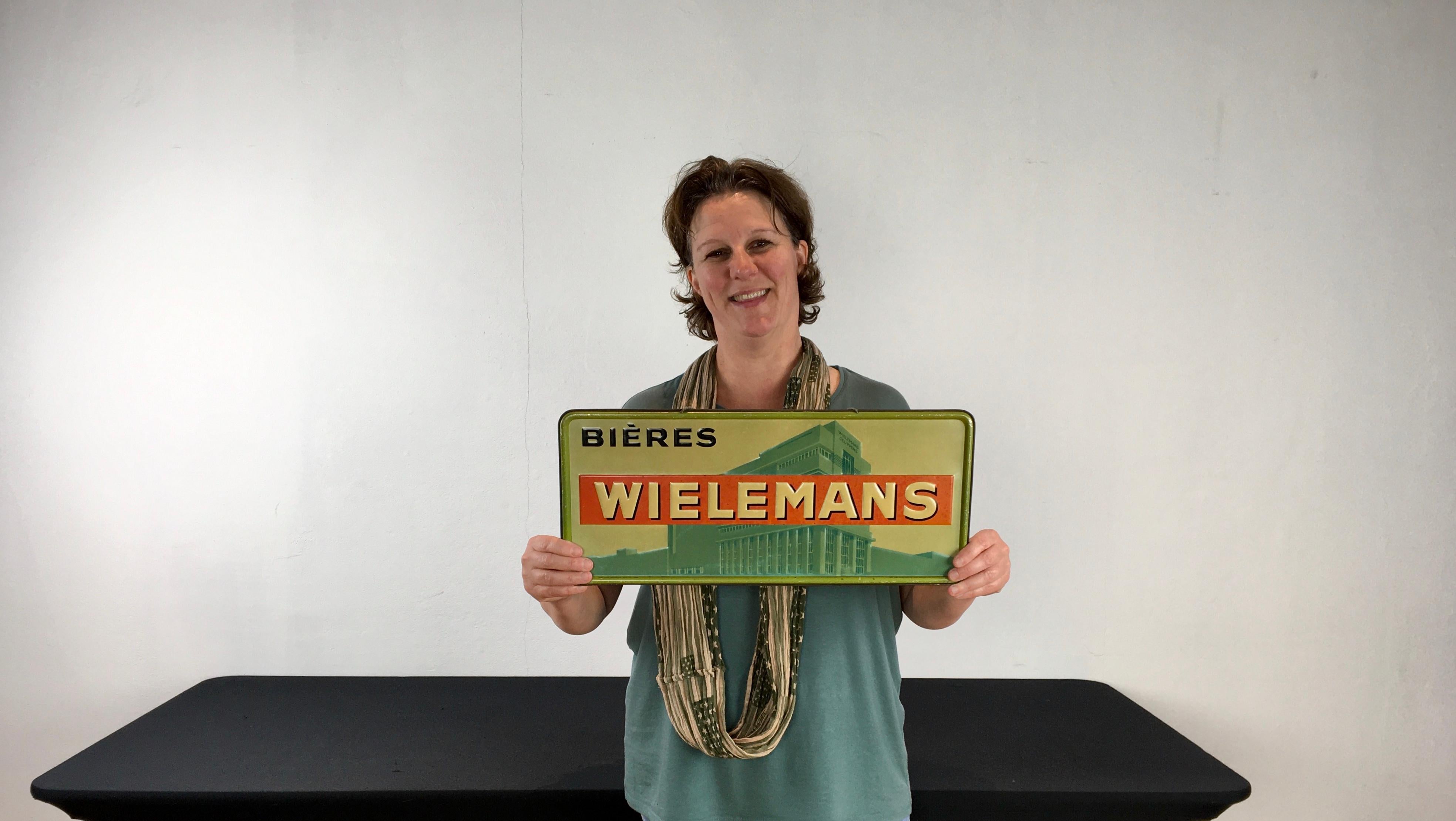 1930s Belgian Beer Sign. 
A tin advertising sign from the Art Deco period in Industrial style for the Belgian Beer Brand Wielemans.
This old tin sign is dated 1934 - Tax was payed in Brussels then.
Great design with the beautiful old Brewery