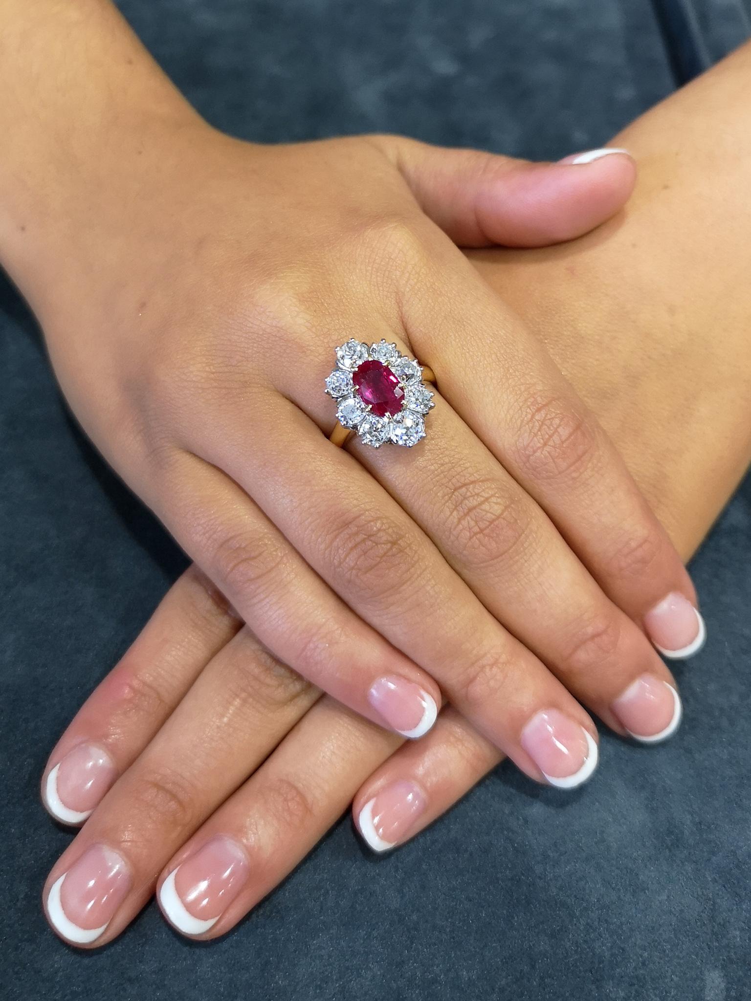 An exceptional 2.10 carat oval ruby with astonishing, blood-red colour and excellent clarity. Accompanied by a certificate from GCS stating that the ruby is natural, of Burma origin and is free from any form of thermal enhancement. Mounted in a