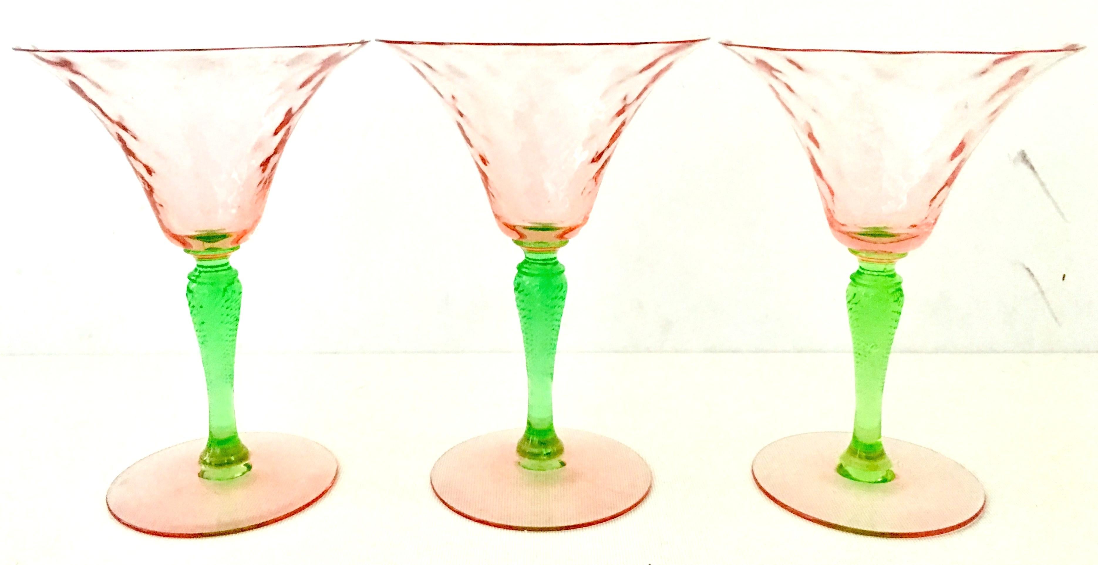 1930's Venetian Style Crystal Stem Martini Drink Glasses, Set Of Three Pieces. Features a optic pink cup and foot with a lovely cut and faceted green stem.  