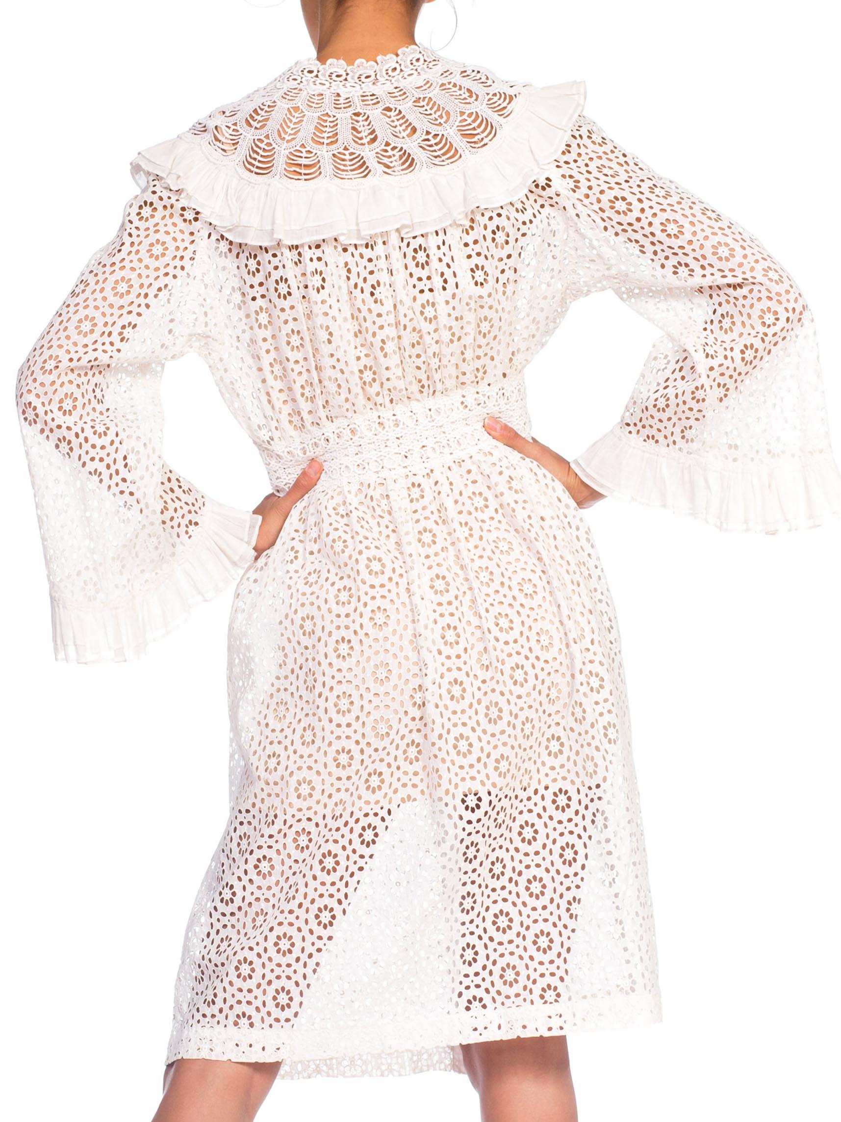 MORPHEW COLLECTION White Organic Cotton Belle Sleeve Dress With Ruffle Detail Made From Victorian Eyelet Lace Duster
MORPHEW COLLECTION is made entirely by hand in our NYC Ateliér of rare antique materials sourced from around the globe. Our
