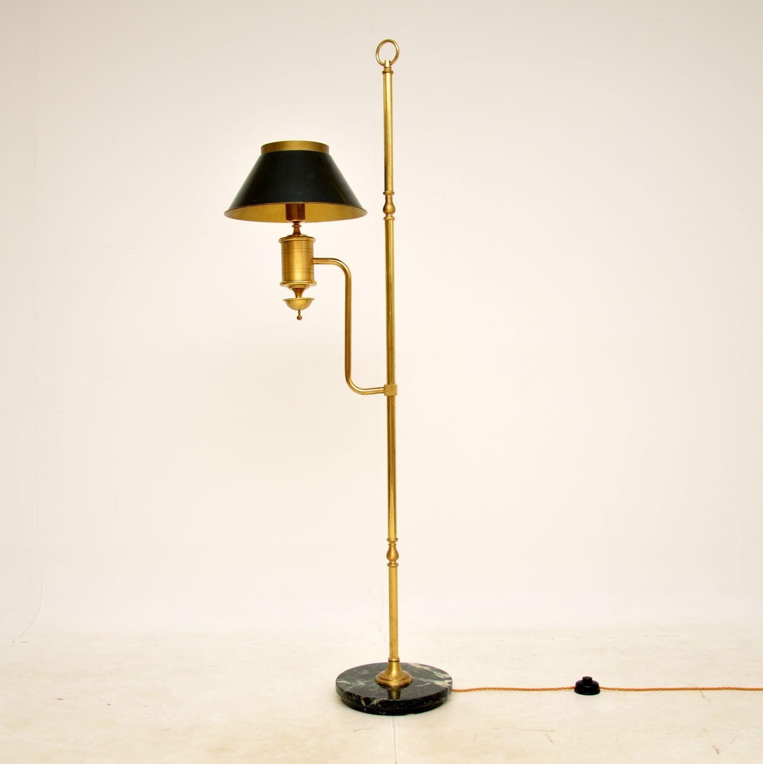 A fantastic vintage brass & marble floor lamp in solid brass and marble, this was made in England and dates from around the 1930-50’s.

It is of superb quality, with stunning green marble base and a gorgeous design. The removable shade is green
