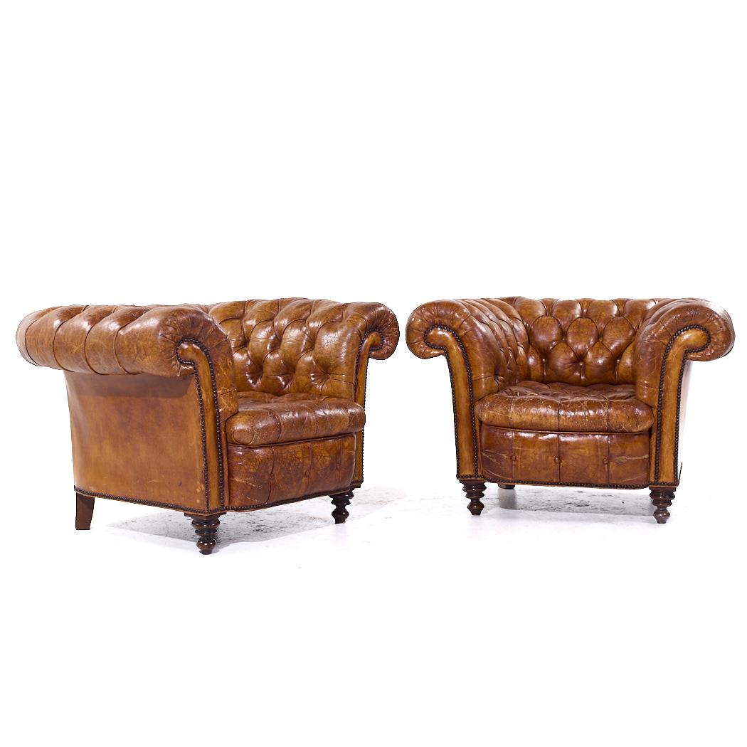 1930s Vintage Cigar Brown Leather Chesterfield Club Armchairs - Pair

Each club chair measures: 41 wide x 38 deep x 28 high, with a seat height of 16 and arm height/chair clearance 28 inches

We take our photos in a controlled lighting studio to
