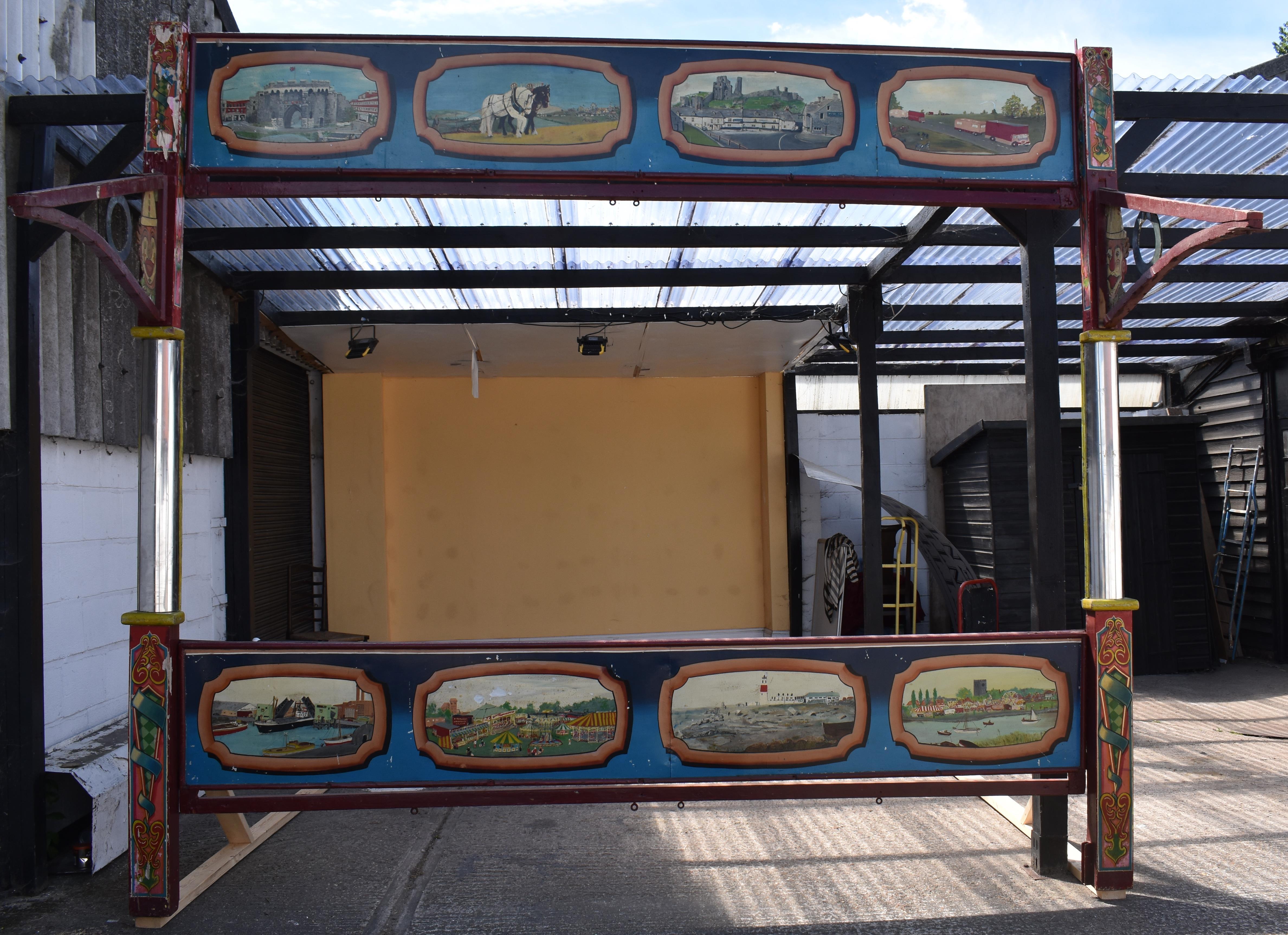 1930s vintage coconut shy originally used at Coles Fairground Exeter, the coconut shy has various scenes top and bottom of fairground amusements, shire horses, Townsends amusements etc. It has two swing arms that hook to the side with painted clowns