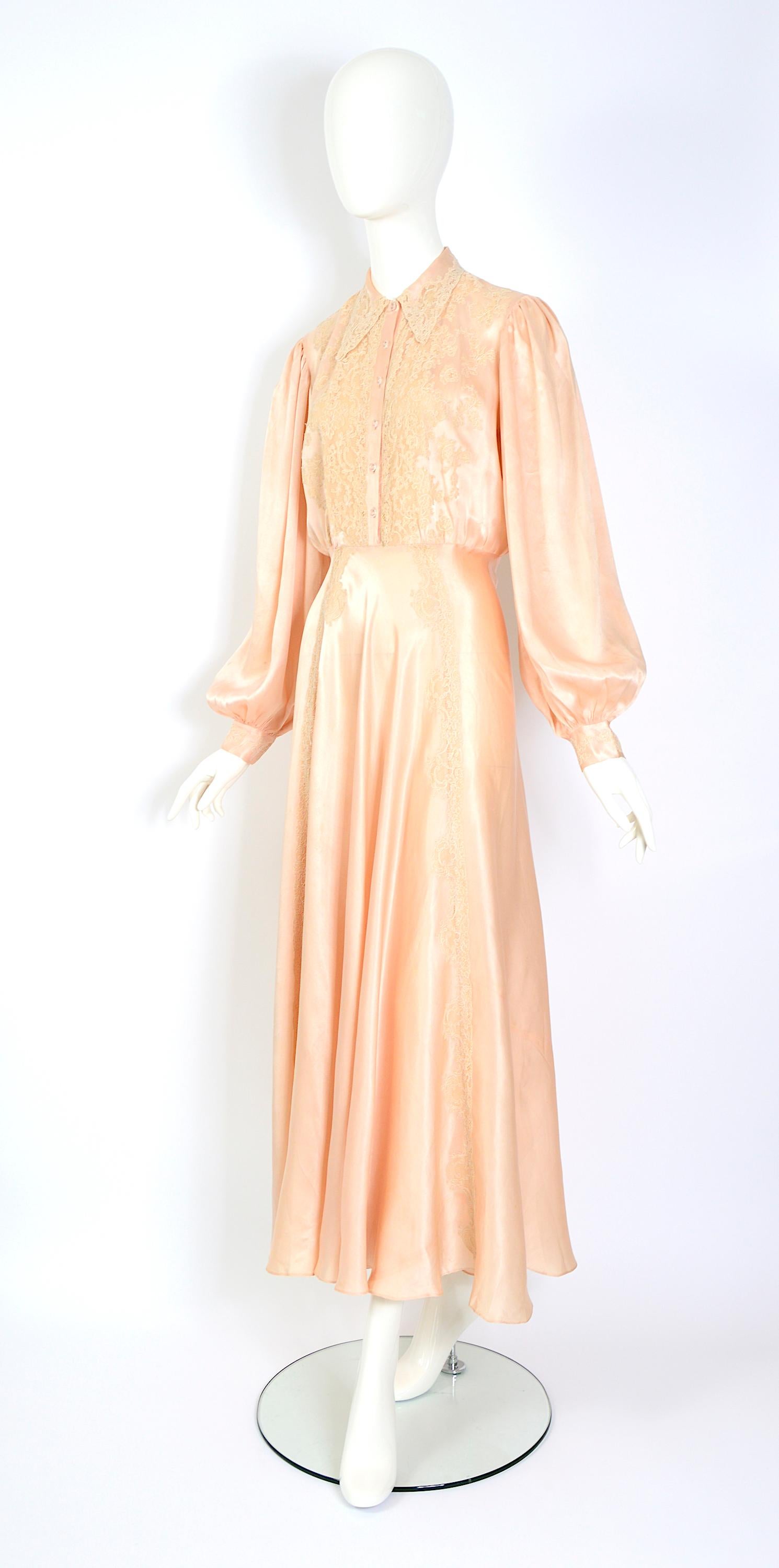 STUNNING! 
Vintage French peach silk satin and lace 1930s antique Hollywood movie star dress.
The doll is French 36/38 and we have not pinned the dress for pictures.
Measurements that are taken flat:
Ua to Ua 20inch/51cm(x2) - Waist 15inch/38cm(x2)