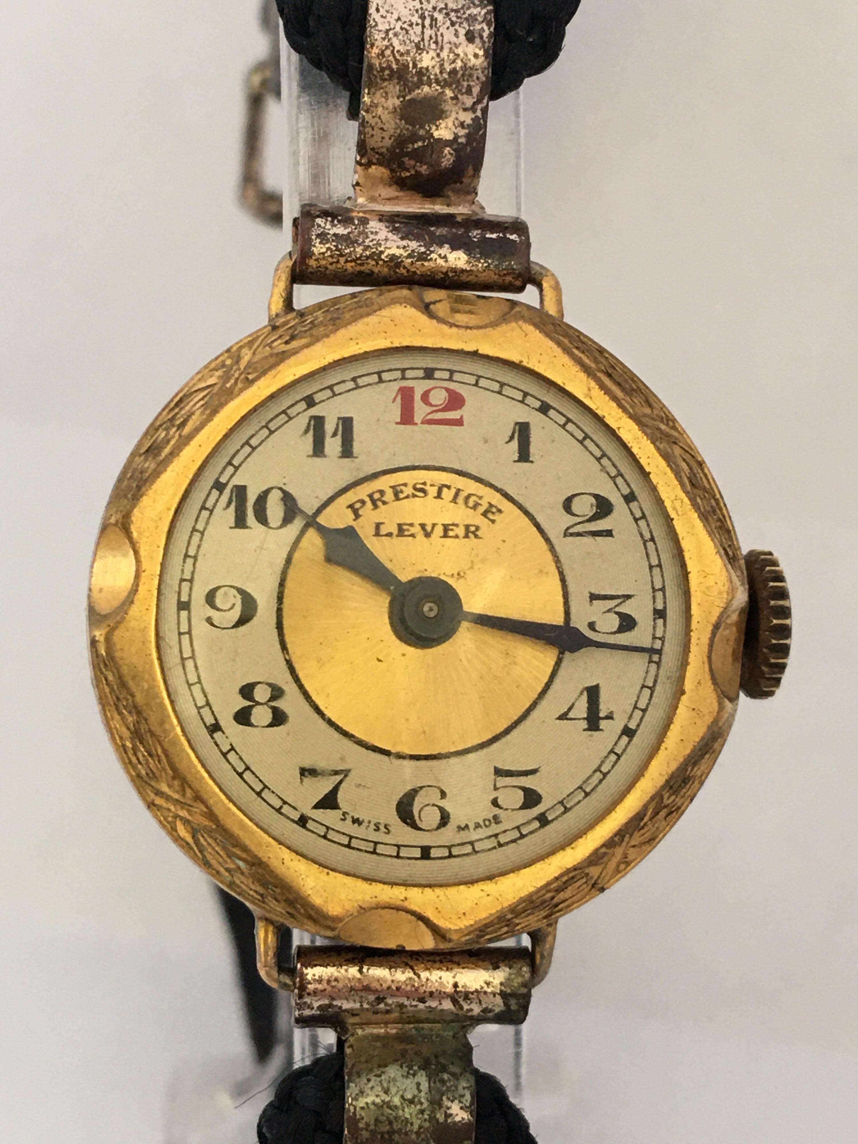 This beautiful vintage hand winding ladies Trench watch is working and it is ticking well. Visible signs of wearing and has some aged with some deterioration on the gold plated watch case as shown. The strap buckle has tarnished.

Please study the