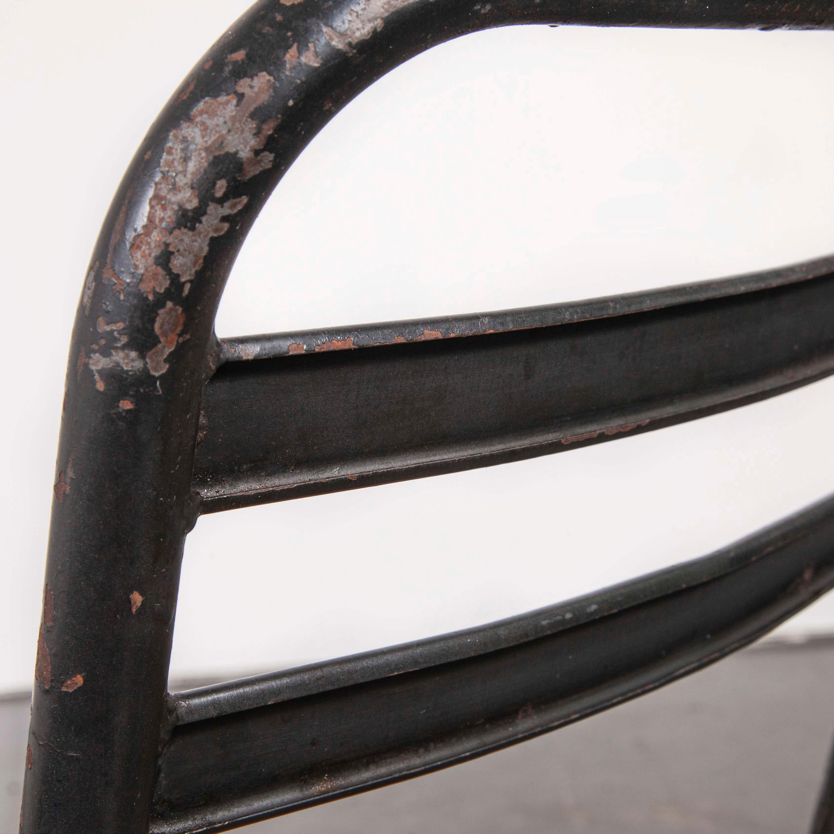 1930s vintage original French Tolix cafe dining chairs, pair. Tolix is one of our all time favourite companies. In 1907 Frenchman Xavier Pauchard discovered that he could protect sheet metal from rusting by dipping it in molten zinc (galvanisation)