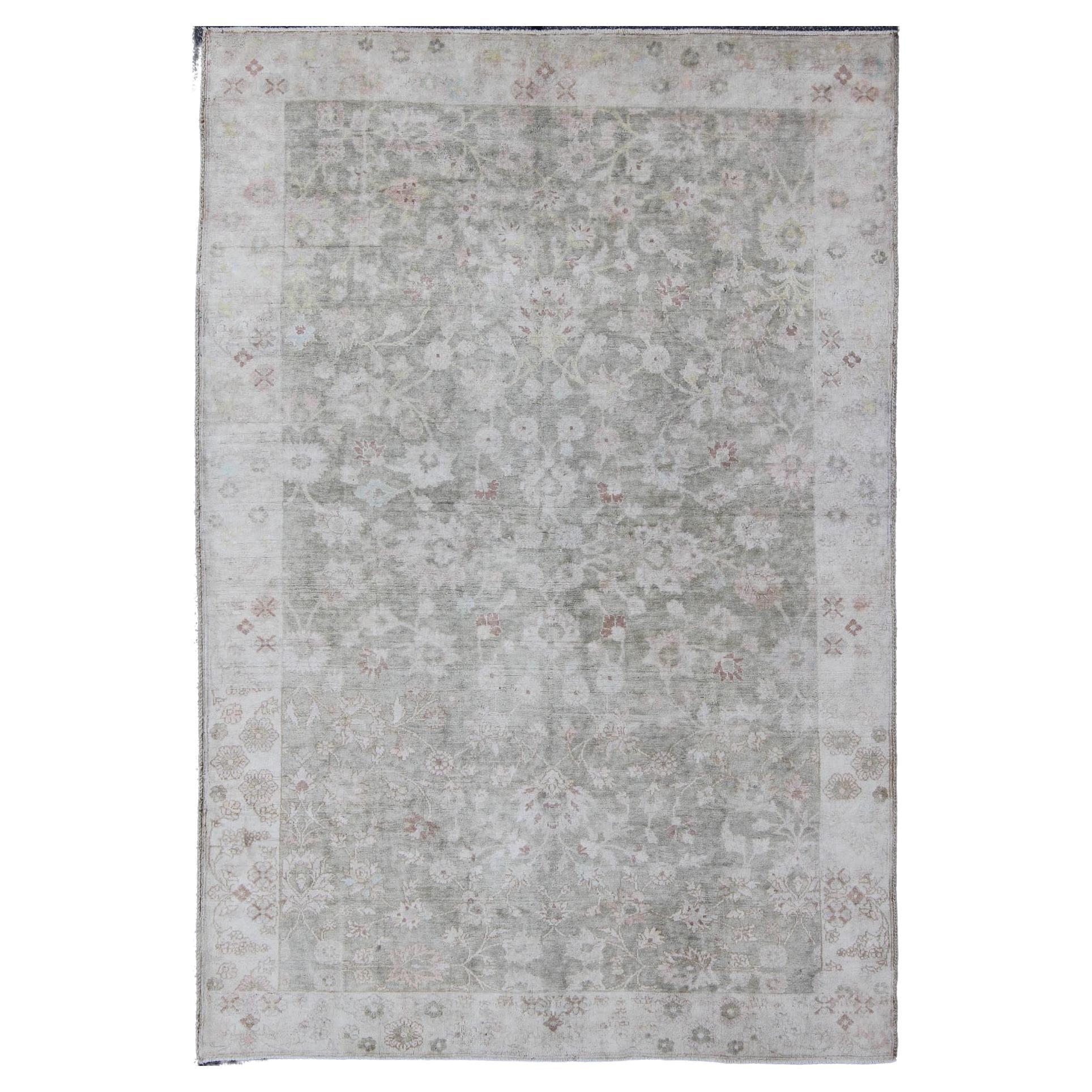 1930's Vintage Turkish Muted Oushak with All-Over Floral Design and Border