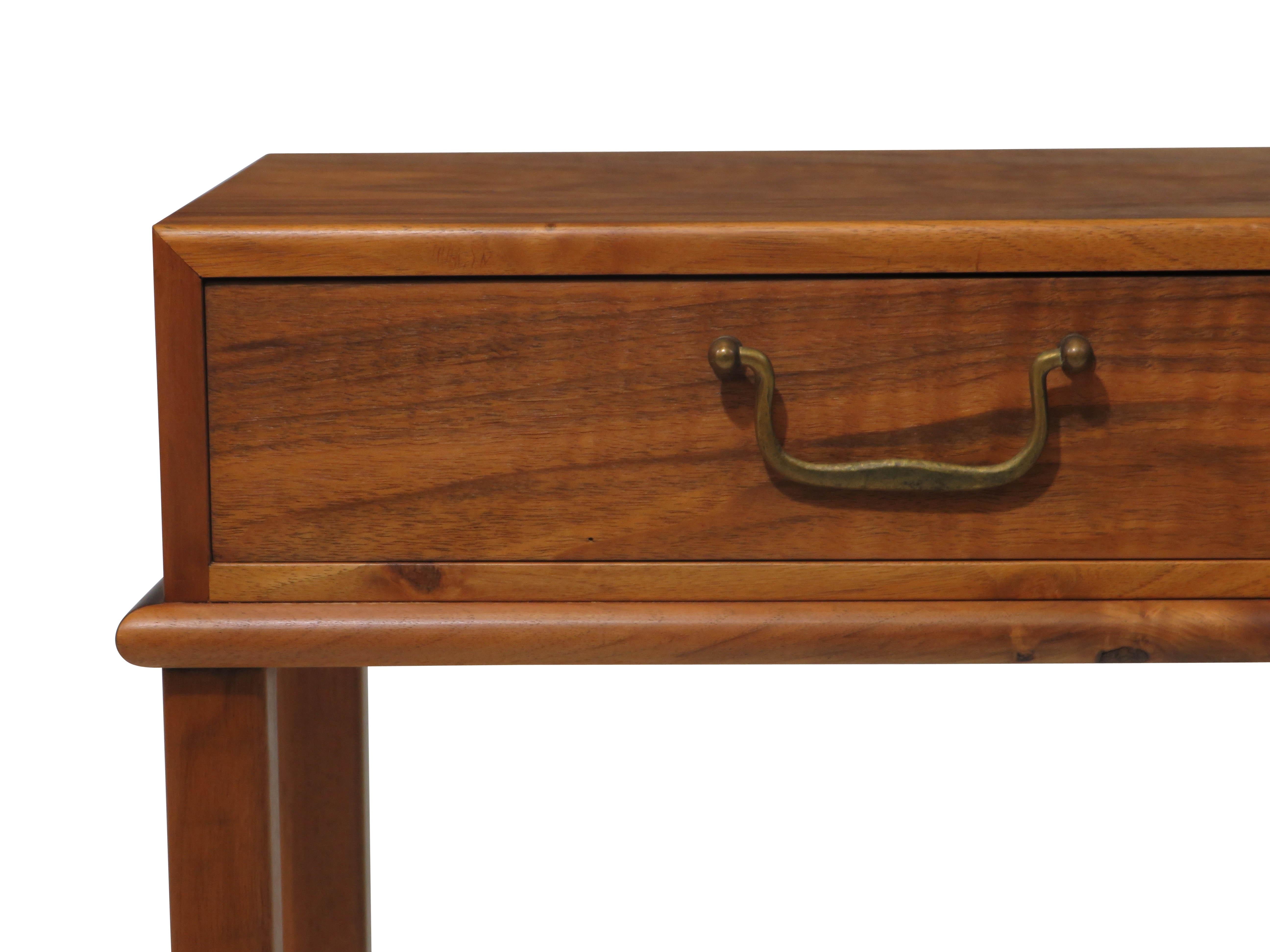 1930's Burled walnut nightstand by Danish cabinetmaker Frederik Staermose.
Handcrafted of figured walnut with mitered corners and traditional brass pull, raised solid walnut legs with cross stretchers.
Finely restored and in excellent condition.