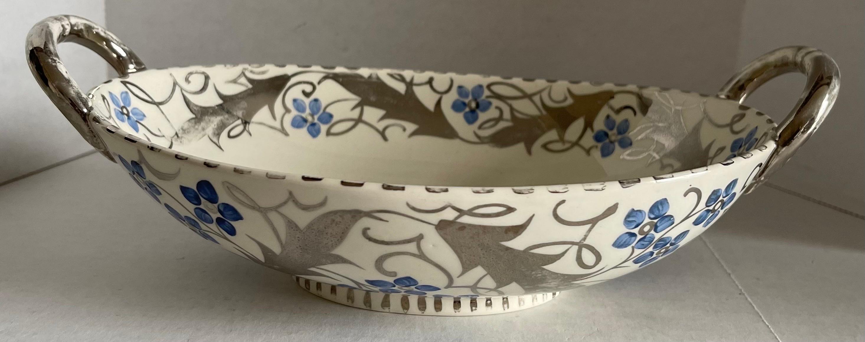 Antique 1930s Wedgwood lustre ware open basket. Bone China with hand painted silver and blue floral design. Brand stamp on the underside. 