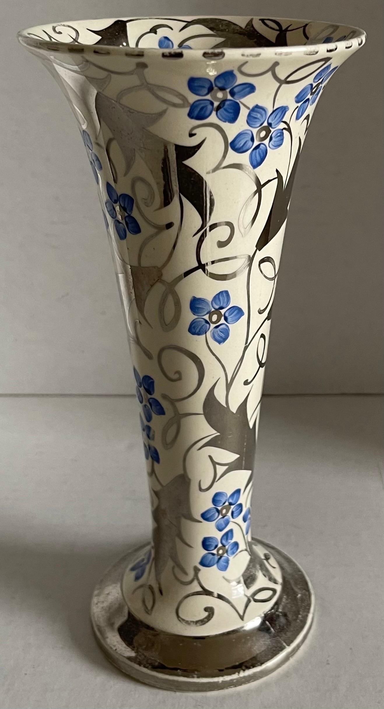 Antique 1930s Wedgwood lustre ware trumpet vase. Bone China with hand painted silver and blue floral design. Brand stamp on the underside. 