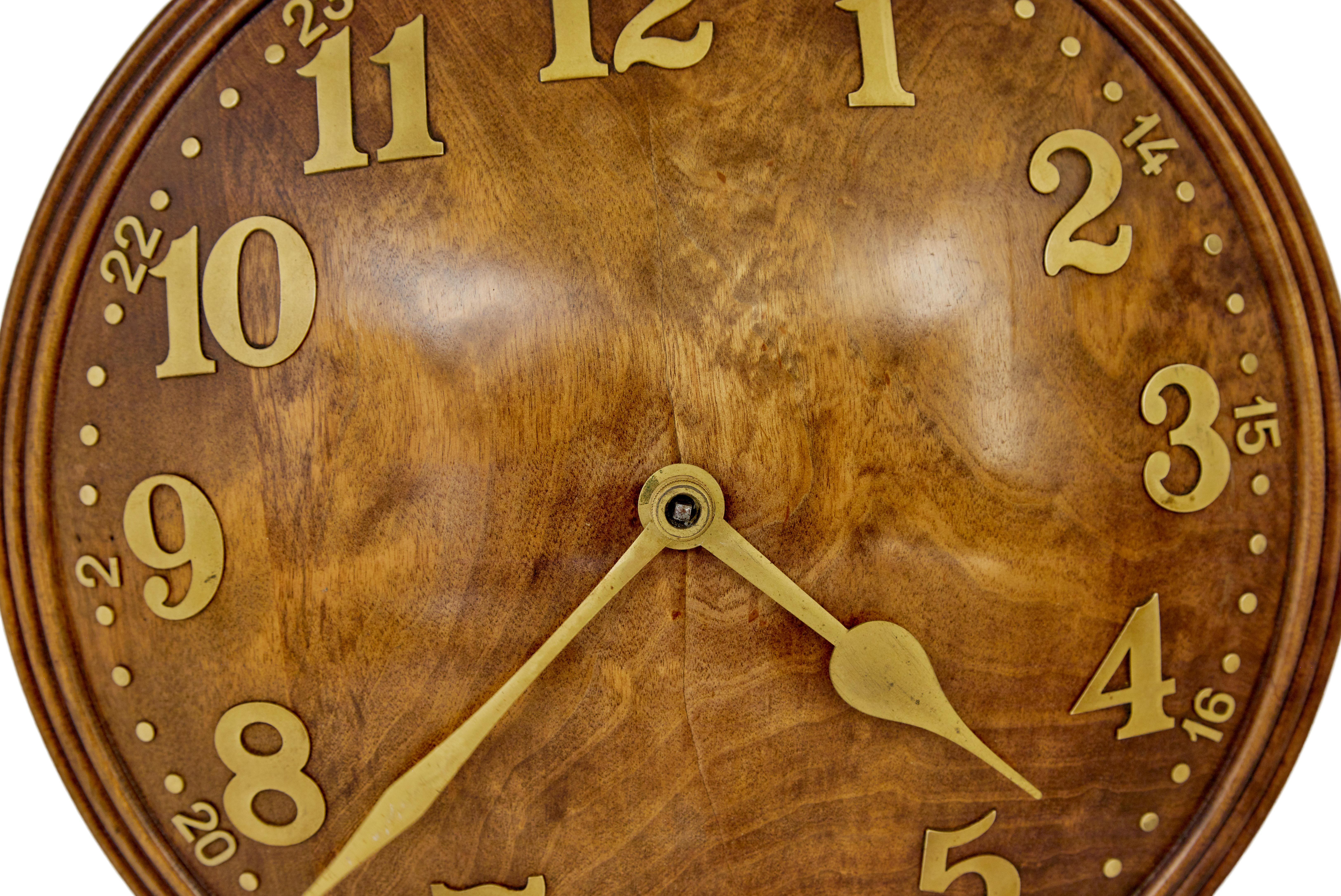 English 1930’s wood and brass convex wall clock by Zenith