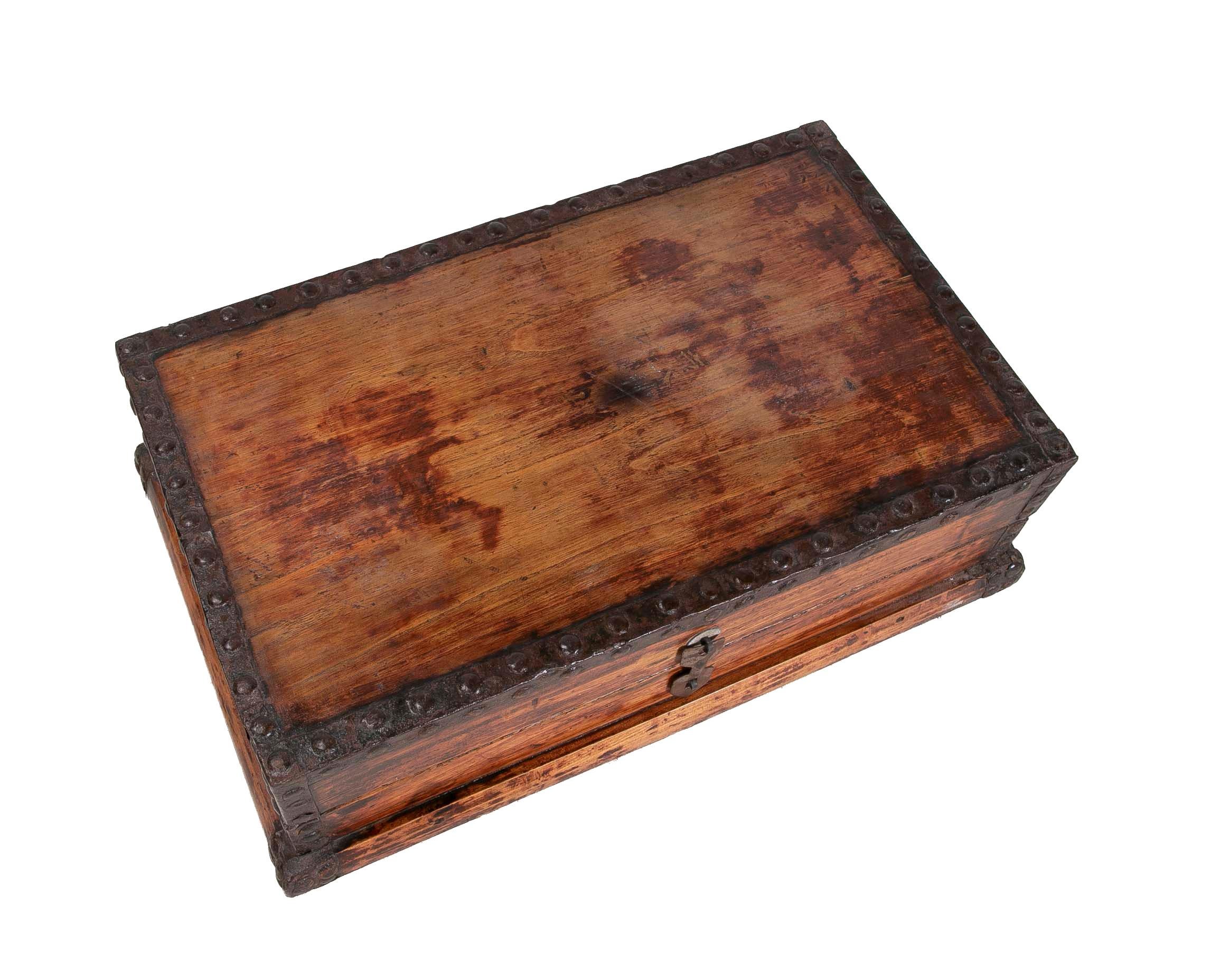 1930s wooden box with iron corners.