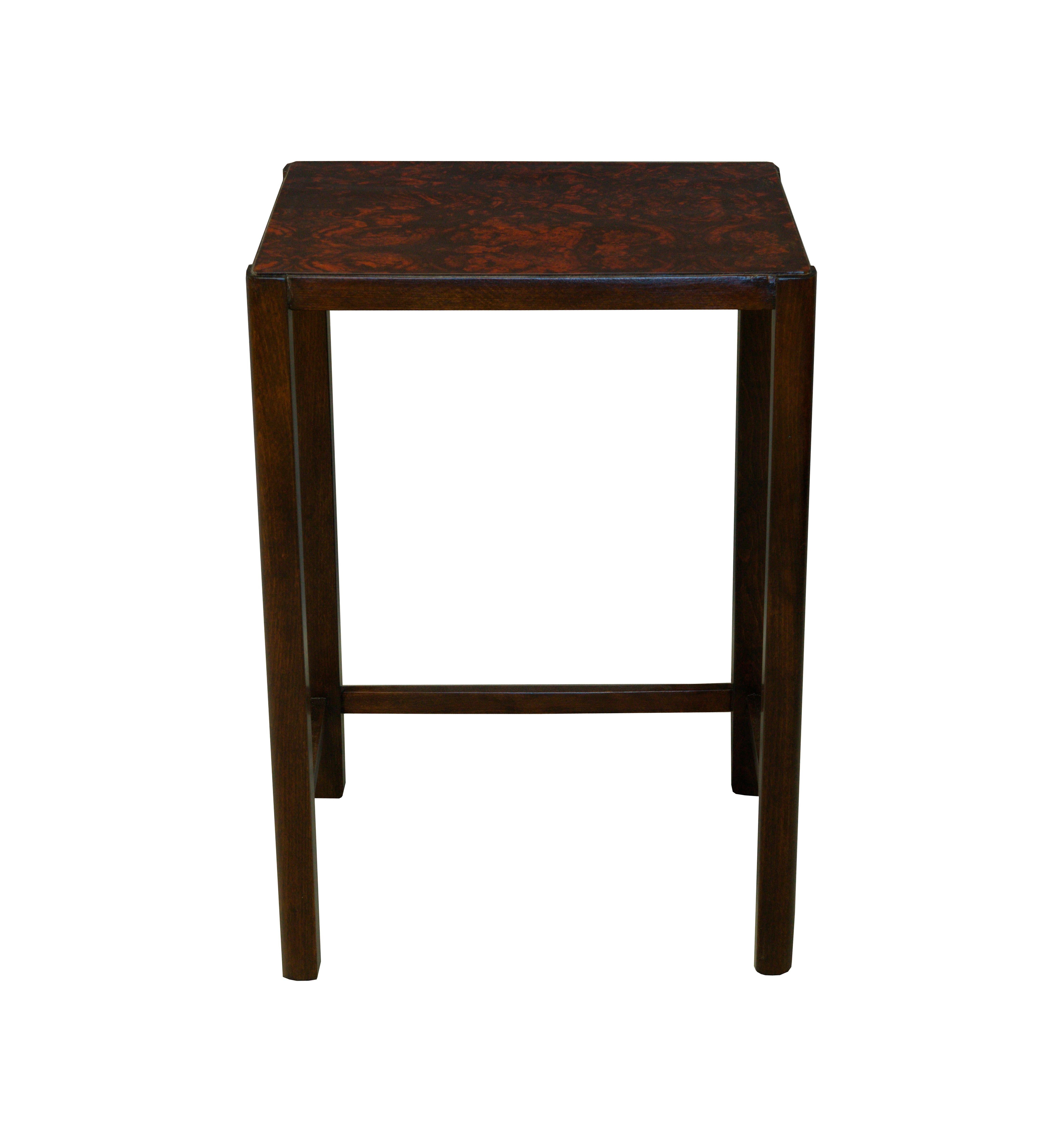 This Minimalistic wooden side table was produced by Thonet Company in the 1930s.
The table is made of beech wood like many of the Thonet famous pieces, but what makes this piece very rare is the stunning imitation of ivory on the worktop.
This is