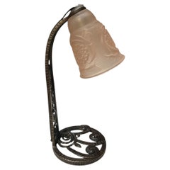 1930's Wrought iron and molded glass shade table lamp