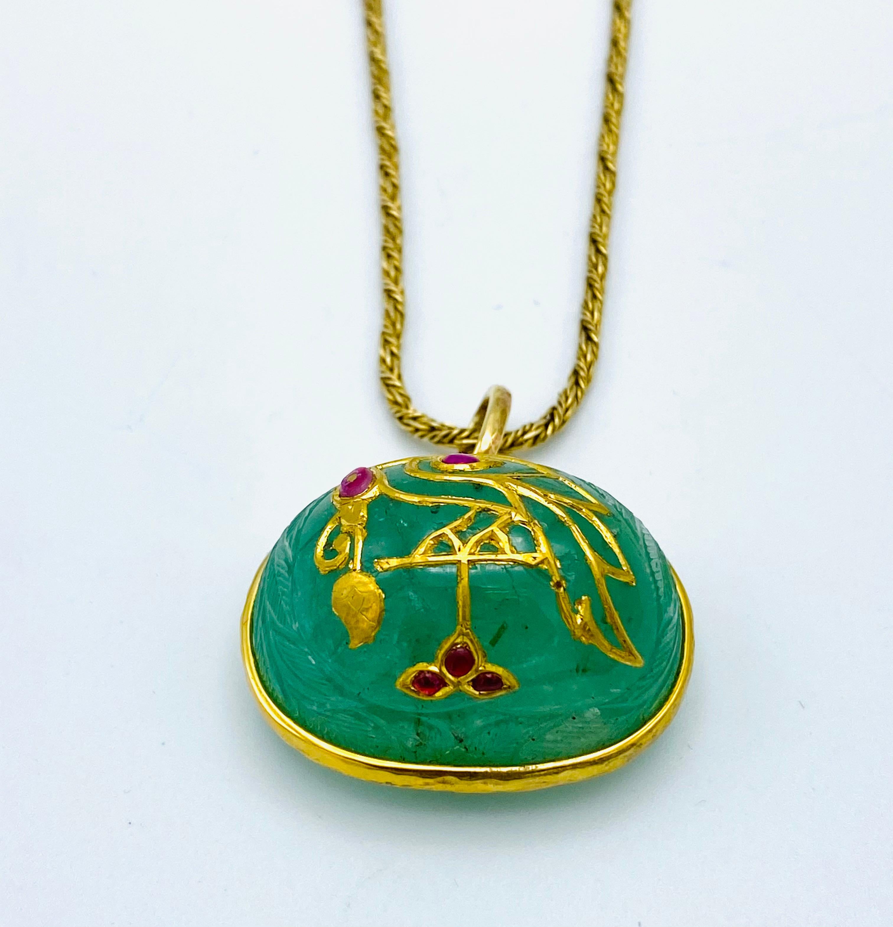 Product details:
Featuring 14K yellow gold, floral motif carved emerald with ruby detail and 10K yellow gold Victorian twisted rope chain necklace.
The pendant measure 1-5/8” W x 1” L x 3/4” H. 30.3 grams.
The chain measure 22- ½” long and 3mm wide.