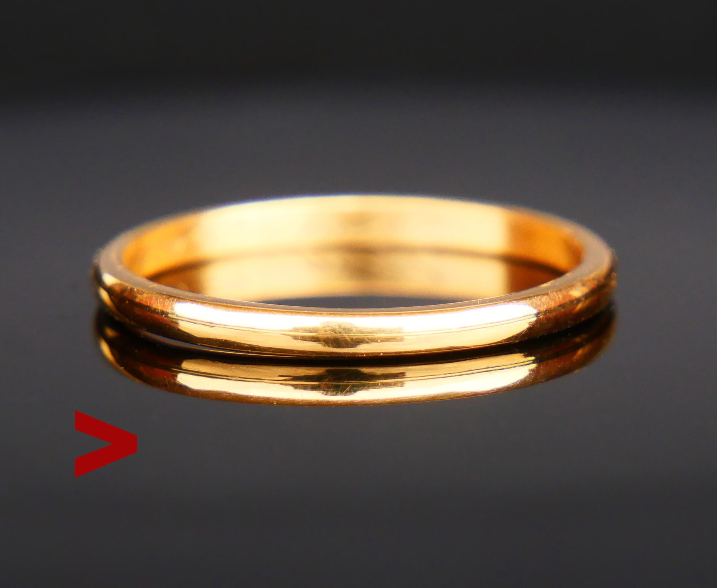 Wedding Ring in solid 23 K Gold. 

Swedish hallmarks. 23K and maker's, made in 1931 ( year marks E8  ).

Size: Ø US 11.5 / 21.08 mm. The band is 2.2 mm wide.  Weight: 4  grams.

Used fine condition,  with engraved date    19  26/12  31 