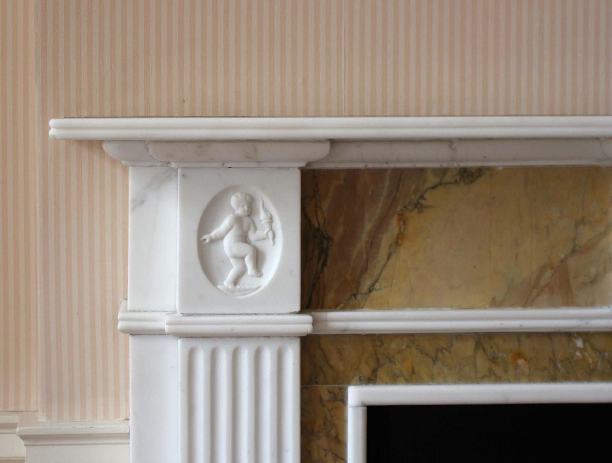 Neoclassical Revival 1931 NYC Waldorf Astoria Hotel English Marble Mantel with Figural Child Motif