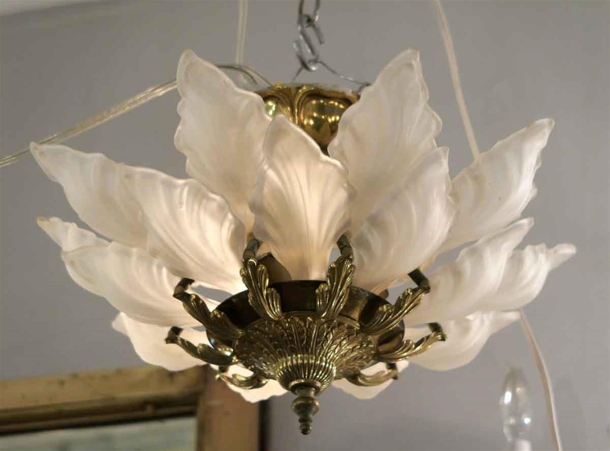 193 Alba Macbeth Evans white petal ceiling fixture made of cast glass with a heavy brass fitter. This is a semi flush fixture. These lights adorned various suites of the Towers of the NYC Waldorf Astoria Hotel. One available. Waldorf Astoria