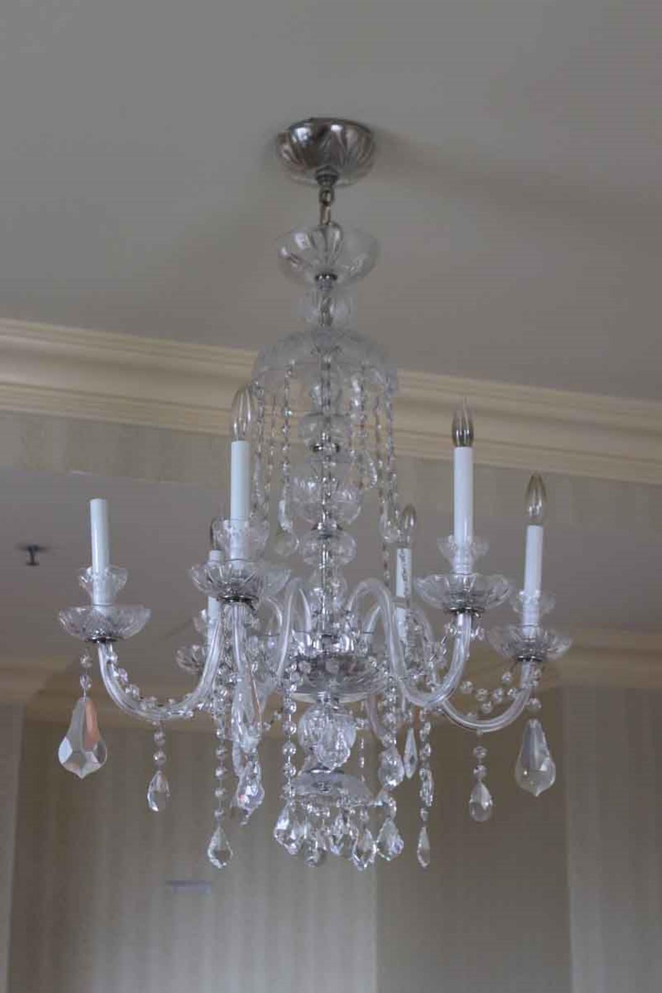 1980s six arm crystal chandelier with nickel and etched glass fittings. From the 1980s renovation of the famous NYC Waldorf Astoria Hotel. These lights adorned the corridors of the towers of the Waldorf Astoria Hotel. Waldorf Astoria authenticity