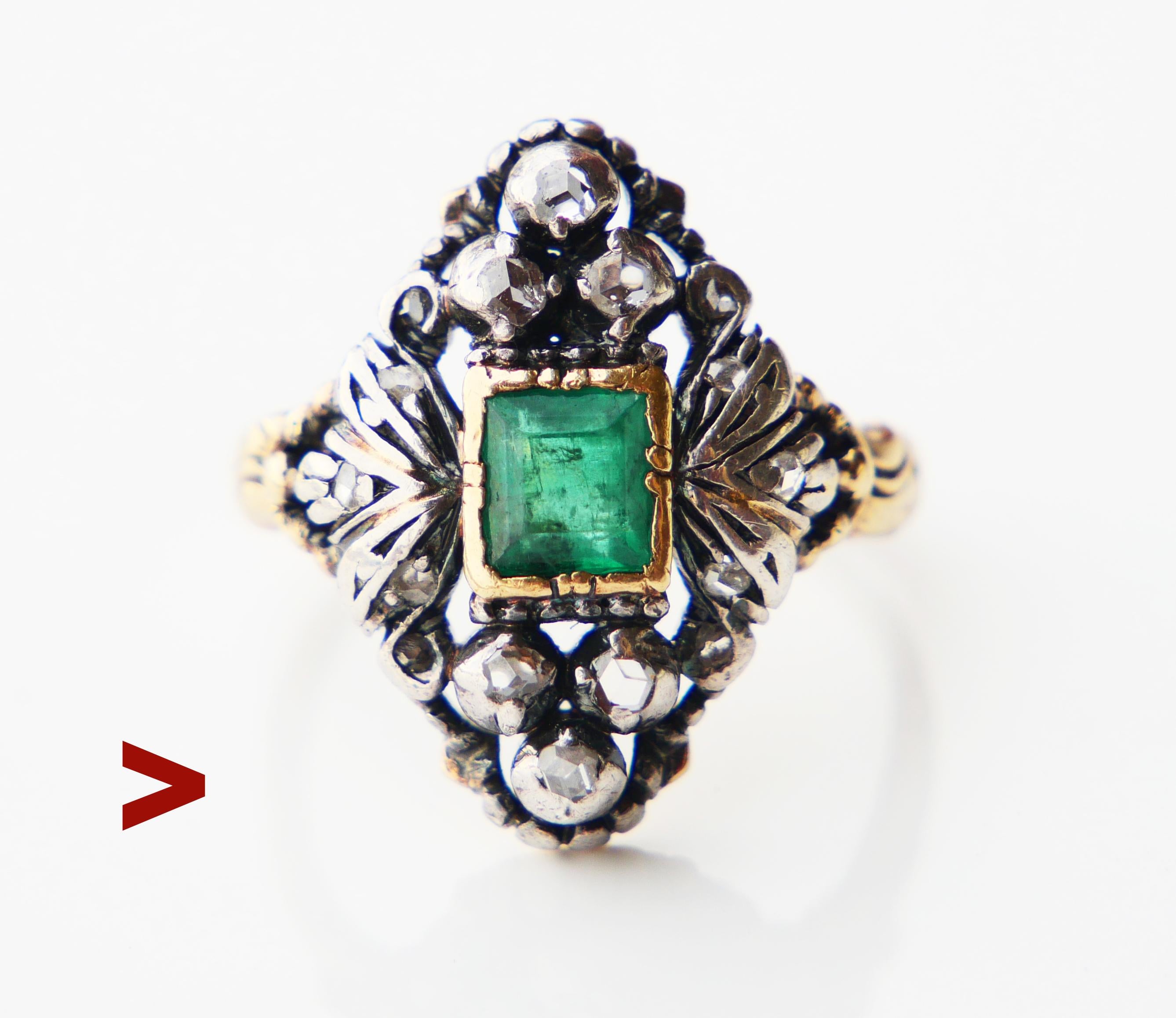 Nice Renaissance-styled cluster Ring with the carved band, shoulders, and parts of the crown in solid 18ct Yellow Gold holding natural Emerald stone and four rose-cut Diamonds set in Silver clusters.

Crown 6 mm x 5.5 mm x 5 mm deep.

Natural