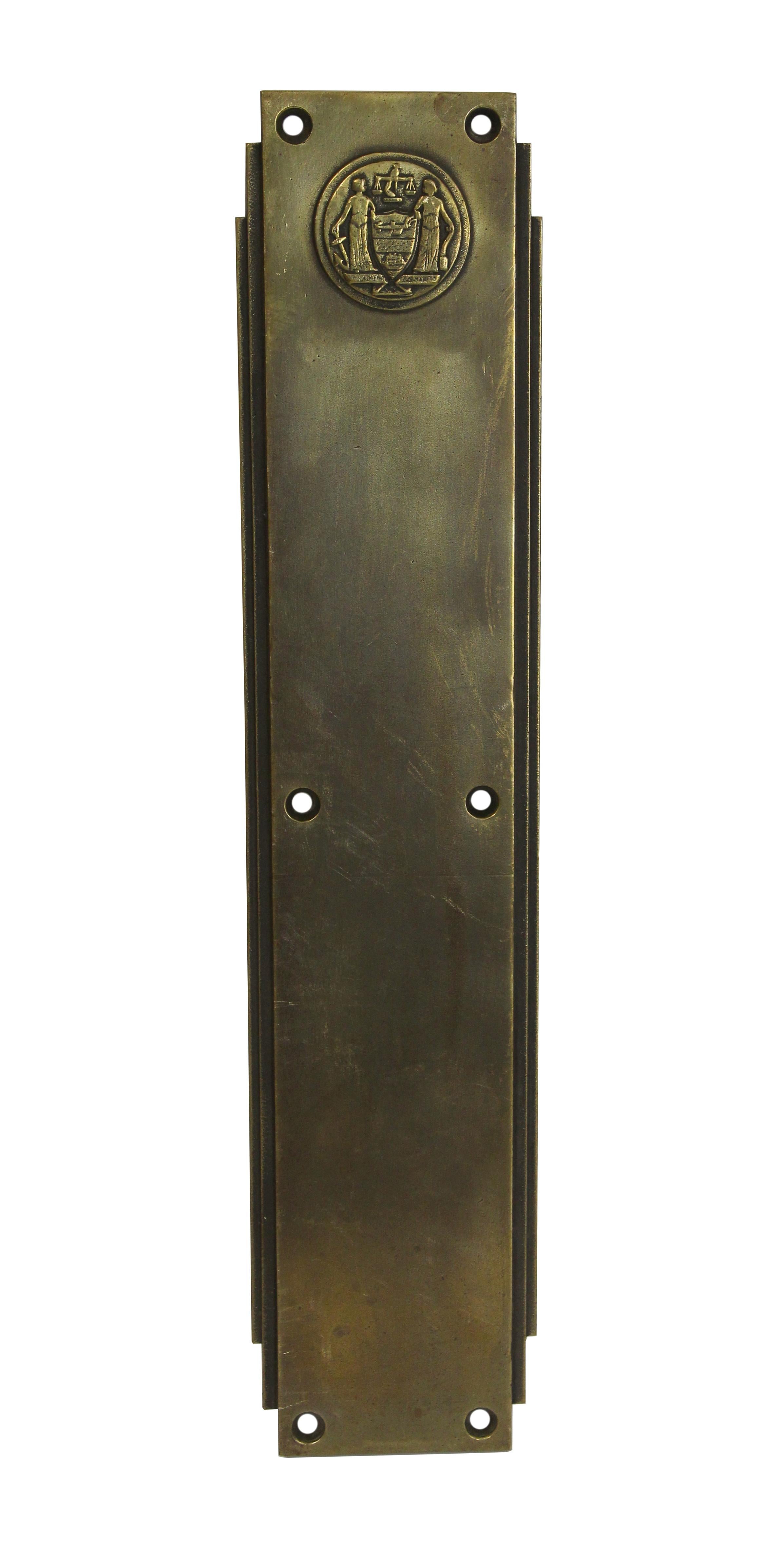 1931 pair of Corbin signed bronze push plates with emblems salvaged from the Philadelphia Civic Center. This pair is made for the front and back of one swinging door. Salvaged by Olde Good Things from The Philadelphia Civic Center in 2005. Priced